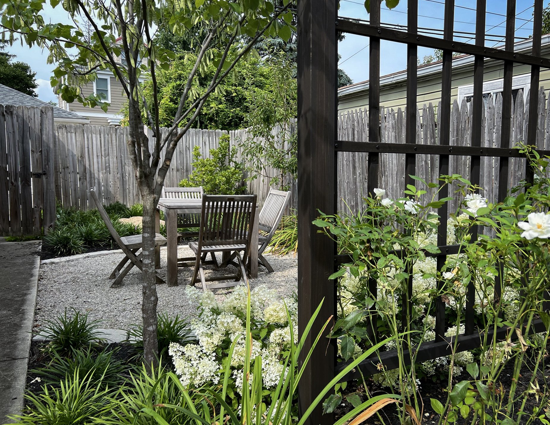 Landscape Architecture Design Gravel Patio and Screen with Roses.jpg