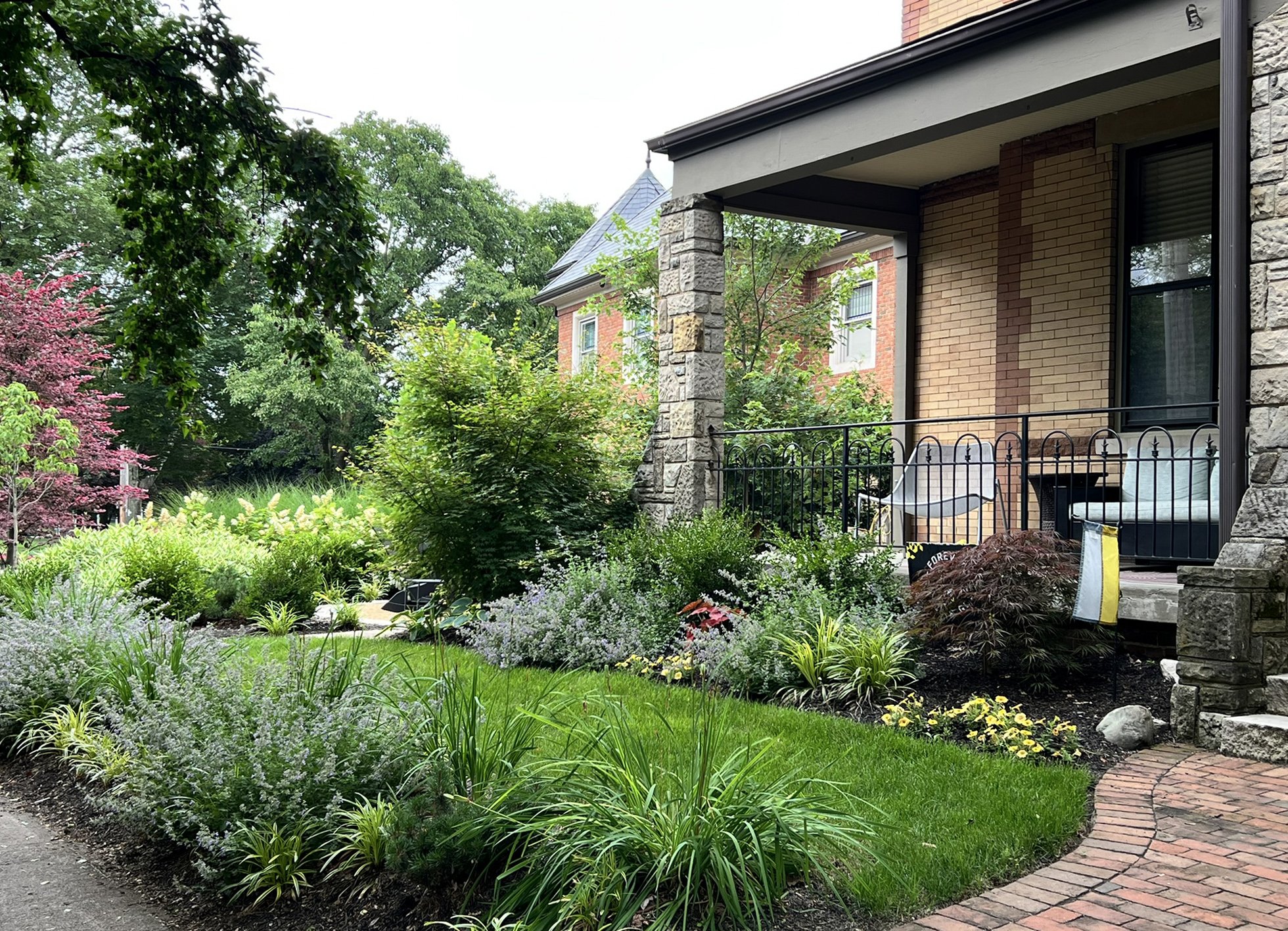 front facade garden with brick walk and catmint.jpg