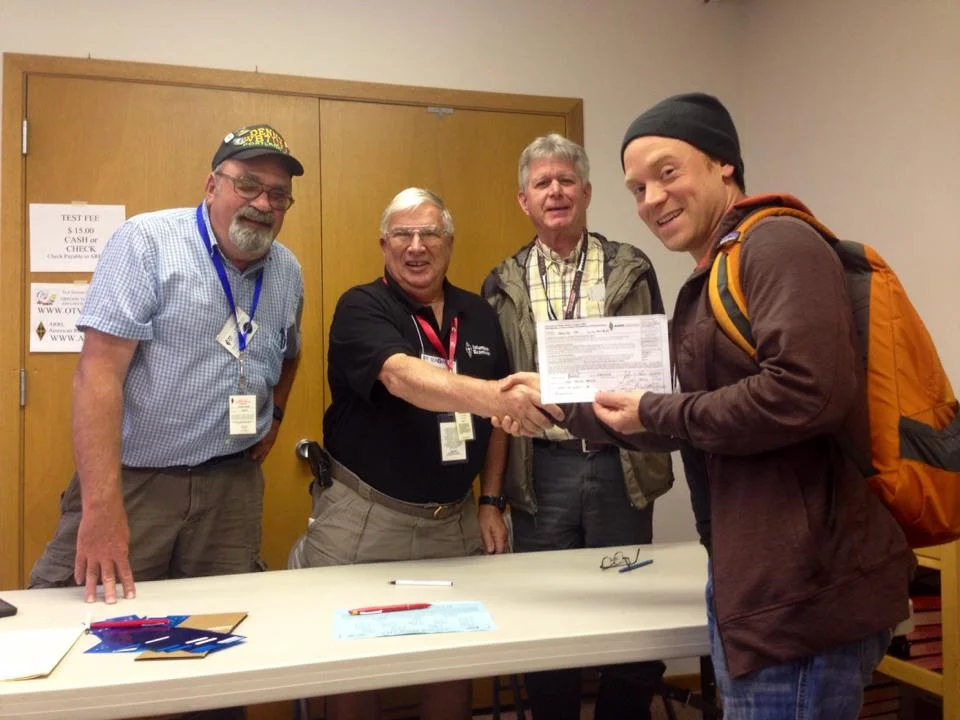 OMs at Sea-Pac handing me my CSCE for my General class license.