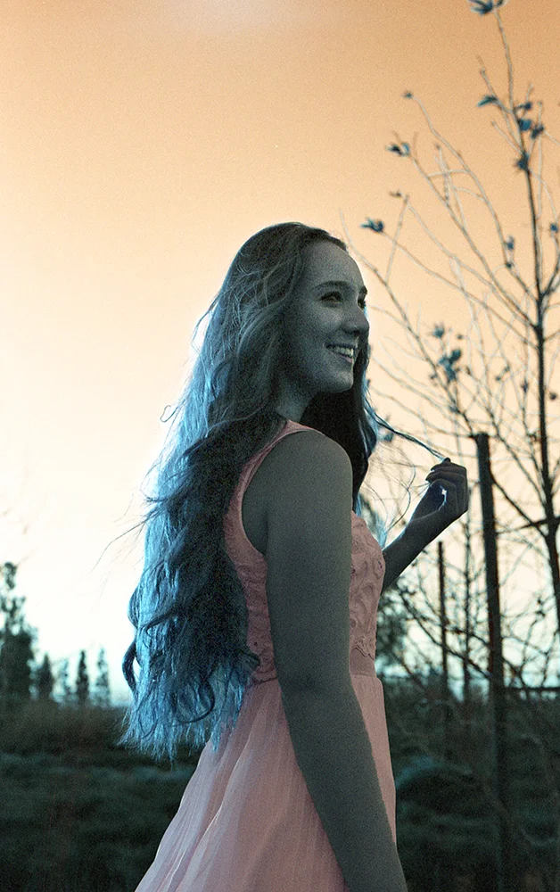 Eva Turquoise Moving Smile.jpg