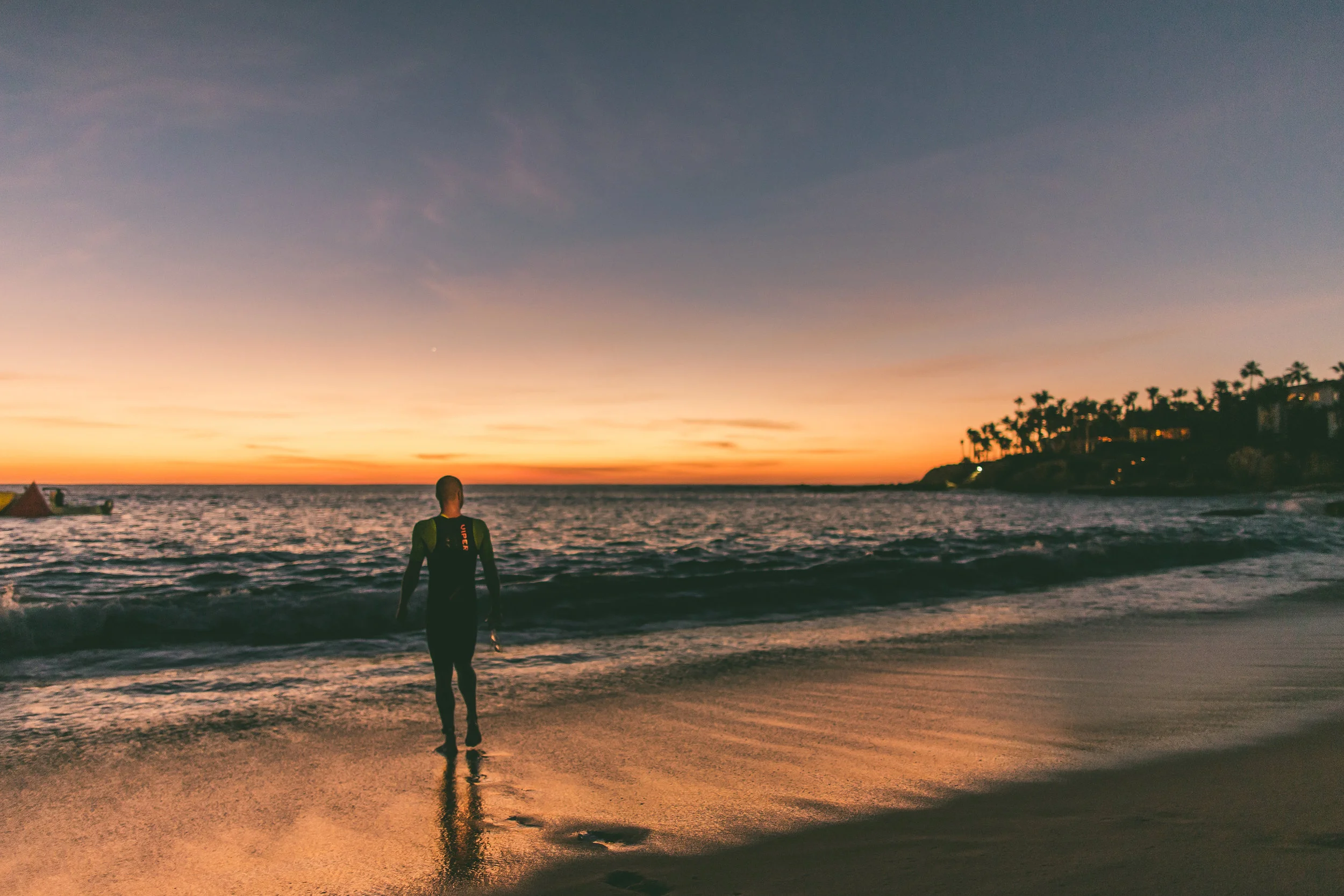 Luke Mckenzie at the waters edge on sunrise.