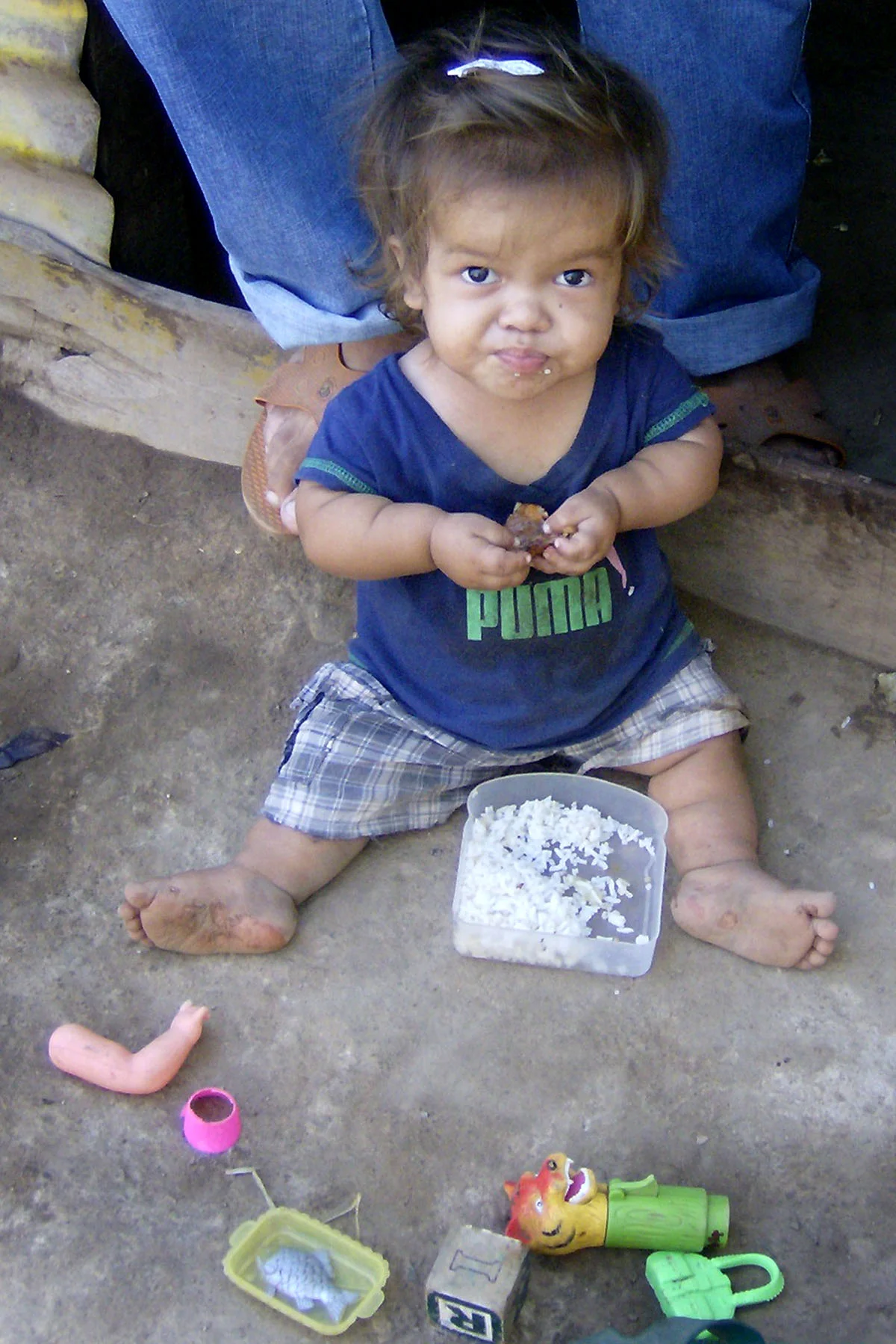 Girl Eating Rice