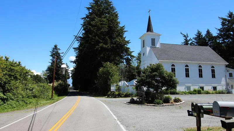 Legoe Bay Road, going by the church