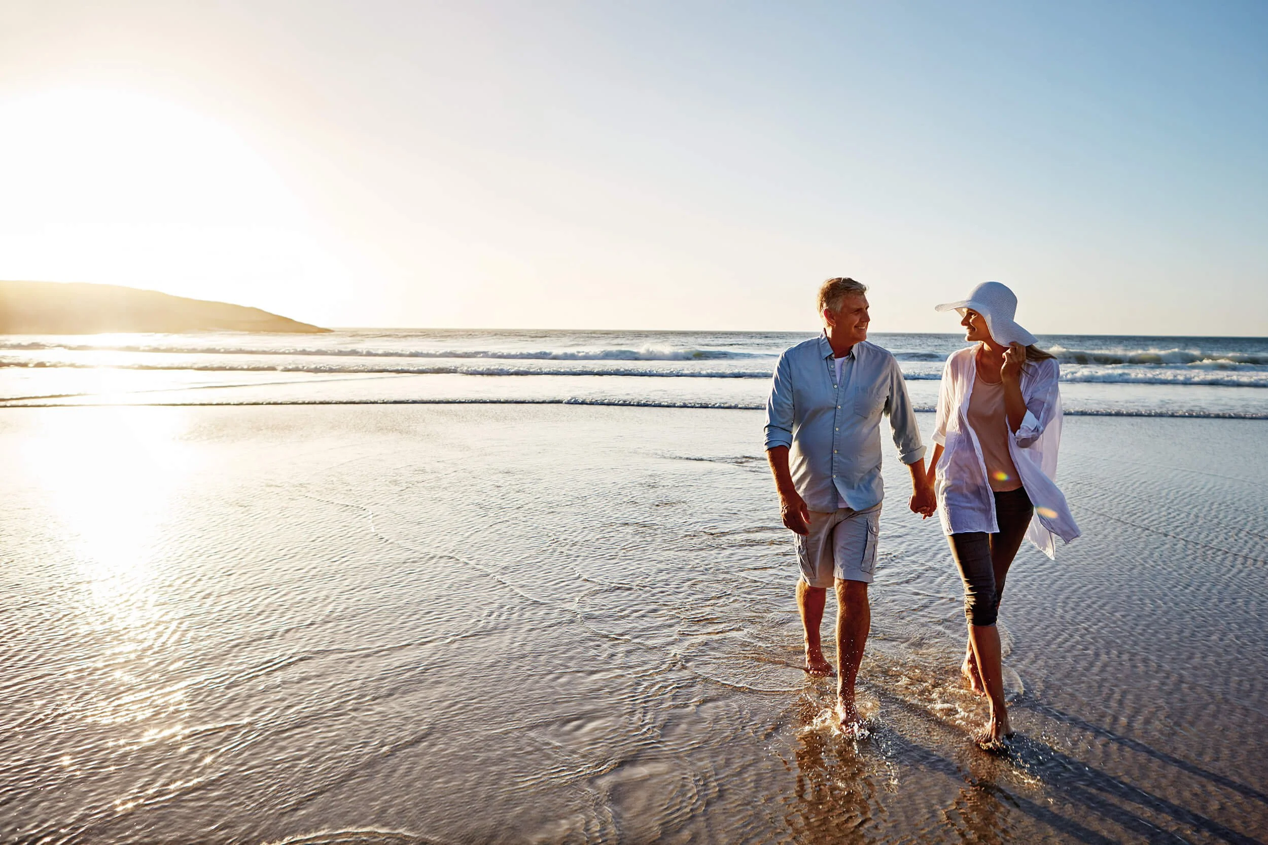 couple-walking-on-beach.jpg