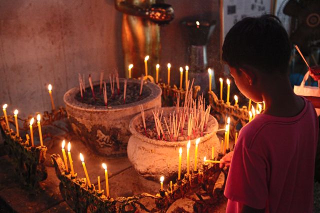 11 Boy Lighting Candles.jpg