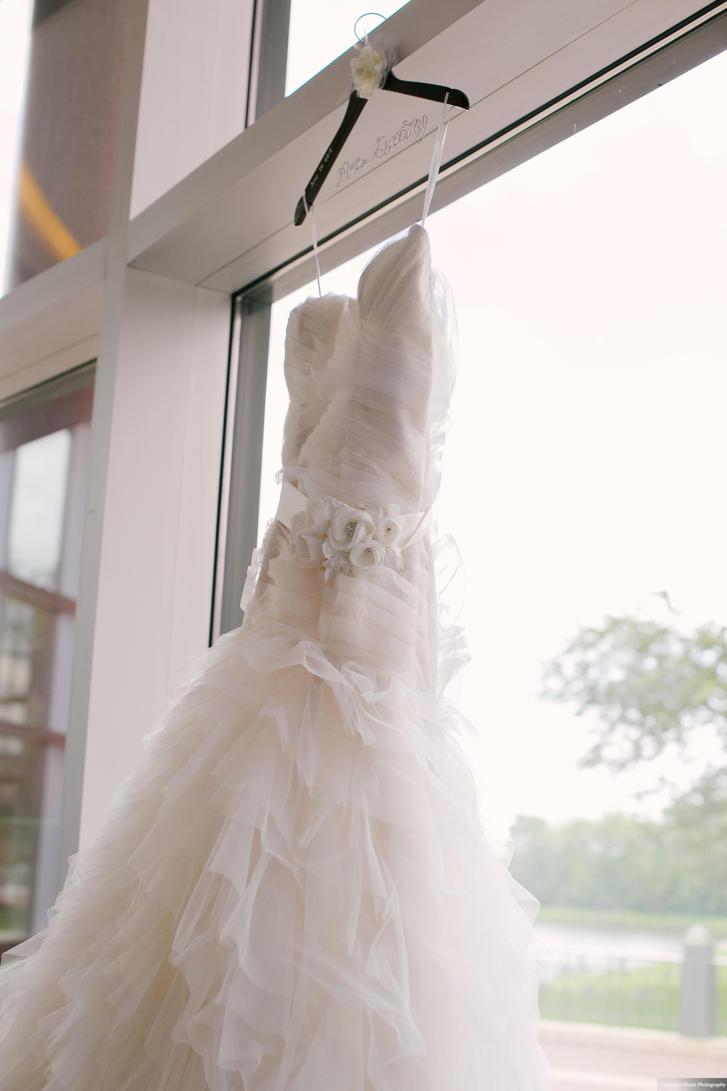 Photographer: Jeannine Marie Photography | Event Venue: The Carlson Towers Rotunda and Amphitheatre | Caterer: Bon Appetit at Carlson Center | Floral & Event Designer: W himsy Designs | Event Planner: Emily, The Simply Elegant Group | Cinema and Video: J Walter Anderson Photo and Video | Cake Designer: Queen of Cakes | Hair Stylist: Sanctuary Salonspa | Makeup Artist: Sanctuary Salonspa | Tuxedo and Mens Attire: Savvi Formalwear | Dress Designer: Stella York | Dress Store: Charlotte’s Bridal | Officiant: Grand Avenue Wedding Officiants | Other: International Cigars | Photo Booth Equipment: The Photo Booth Group | Invitation Designer: Wedding Paper Divas | DJ: Adagio Djay Entertainment