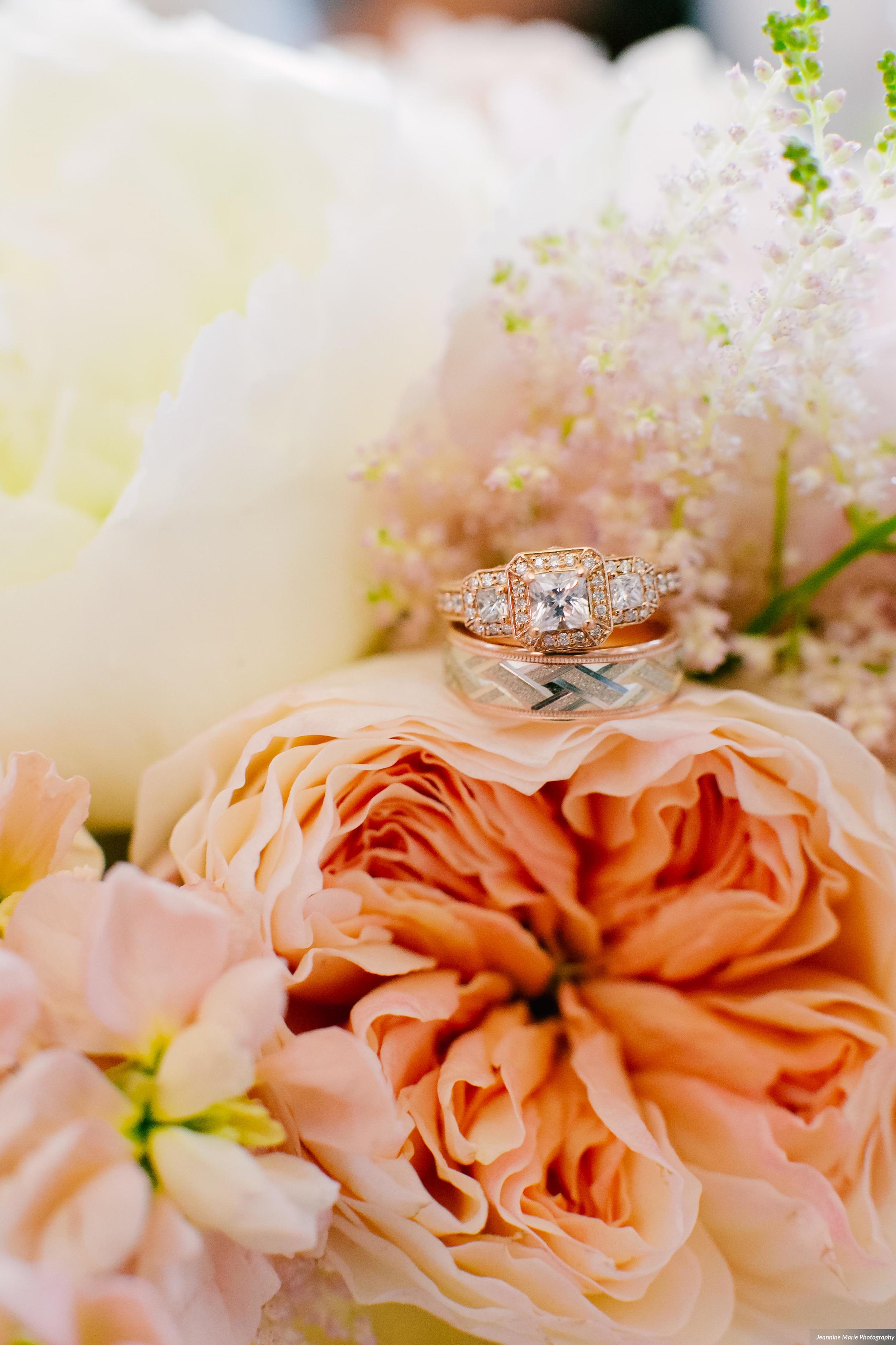Photographer: Jeannine Marie Photography | Event Venue: The Carlson Towers Rotunda and Amphitheatre | Caterer: Bon Appetit at Carlson Center | Floral & Event Designer: W himsy Designs | Event Planner: Emily, The Simply Elegant Group | Cinema and Video: J Walter Anderson Photo and Video | Cake Designer: Queen of Cakes | Hair Stylist: Sanctuary Salonspa | Makeup Artist: Sanctuary Salonspa | Tuxedo and Mens Attire: Savvi Formalwear | Dress Designer: Stella York | Dress Store: Charlotte’s Bridal | Officiant: Grand Avenue Wedding Officiants | Other: International Cigars | Photo Booth Equipment: The Photo Booth Group | Invitation Designer: Wedding Paper Divas | DJ: Adagio Djay Entertainment