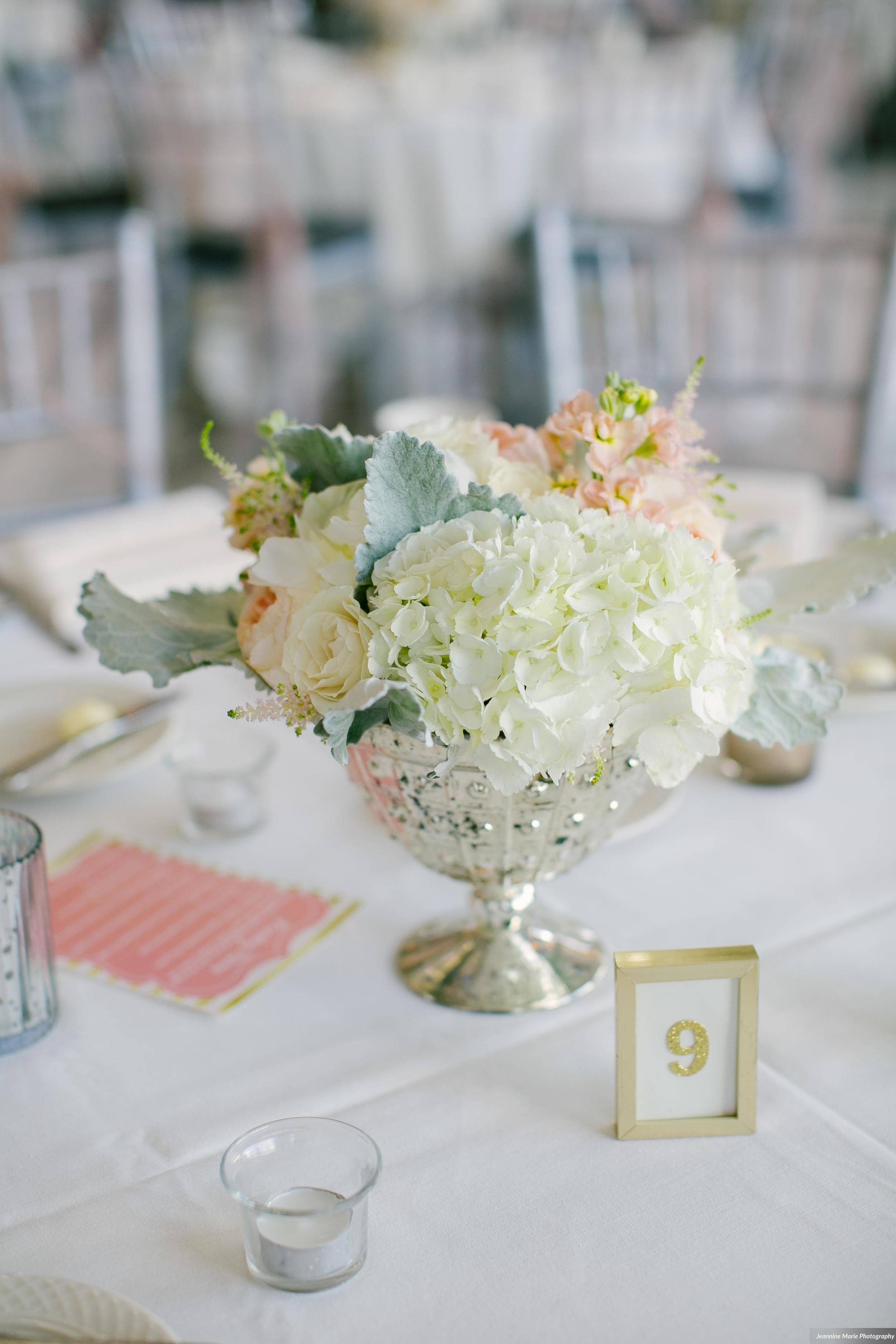 Photographer: Jeannine Marie Photography | Event Venue: The Carlson Towers Rotunda and Amphitheatre | Caterer: Bon Appetit at Carlson Center | Floral & Event Designer: W himsy Designs | Event Planner: Emily, The Simply Elegant Group | Cinema and Video: J Walter Anderson Photo and Video | Cake Designer: Queen of Cakes | Hair Stylist: Sanctuary Salonspa | Makeup Artist: Sanctuary Salonspa | Tuxedo and Mens Attire: Savvi Formalwear | Dress Designer: Stella York | Dress Store: Charlotte’s Bridal | Officiant: Grand Avenue Wedding Officiants | Other: International Cigars | Photo Booth Equipment: The Photo Booth Group | Invitation Designer: Wedding Paper Divas | DJ: Adagio Djay Entertainment