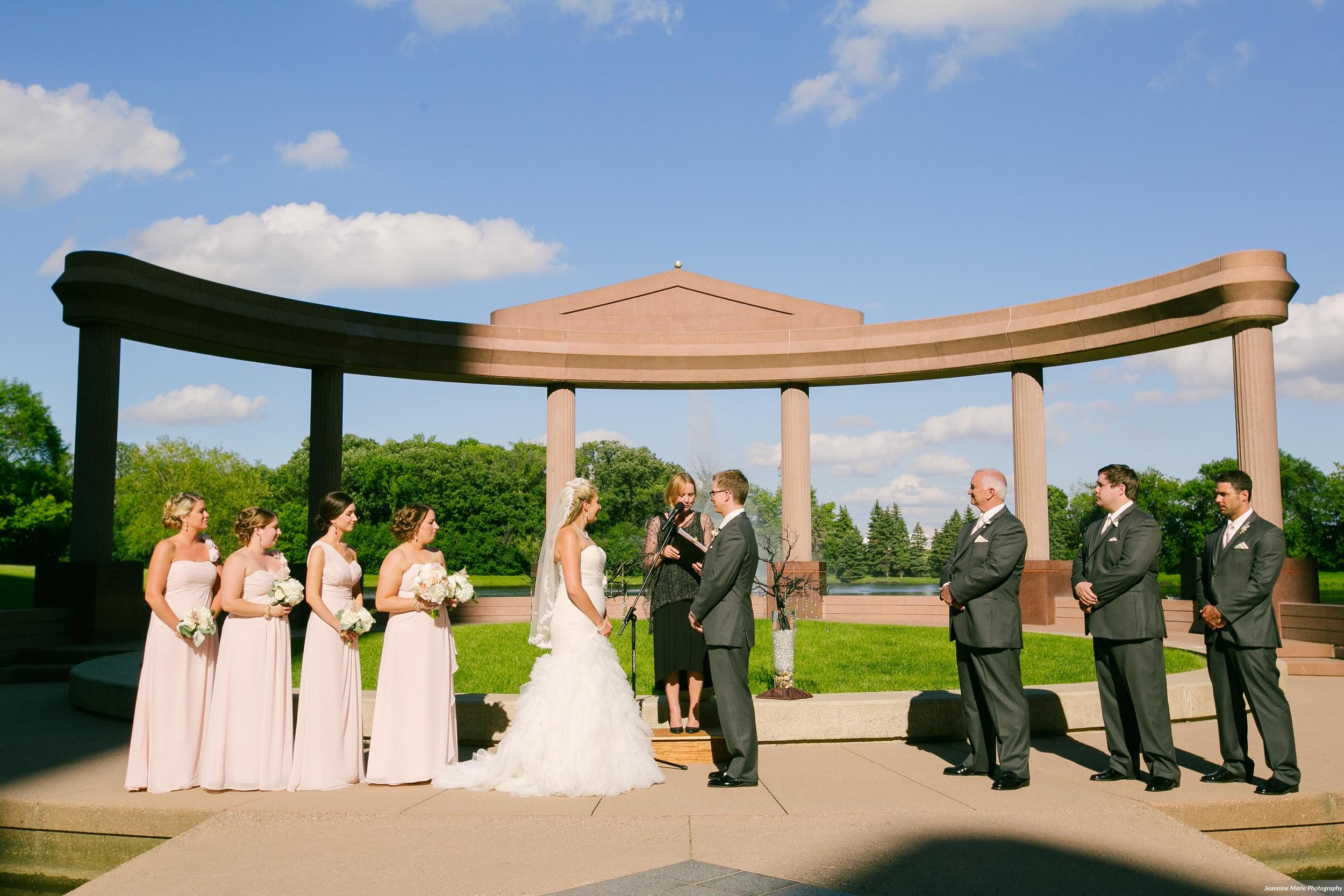 Photographer: Jeannine Marie Photography | Event Venue: The Carlson Towers Rotunda and Amphitheatre | Caterer: Bon Appetit at Carlson Center | Floral & Event Designer: W himsy Designs | Event Planner: Emily, The Simply Elegant Group | Cinema and Video: J Walter Anderson Photo and Video | Cake Designer: Queen of Cakes | Hair Stylist: Sanctuary Salonspa | Makeup Artist: Sanctuary Salonspa | Tuxedo and Mens Attire: Savvi Formalwear | Dress Designer: Stella York | Dress Store: Charlotte’s Bridal | Officiant: Grand Avenue Wedding Officiants | Other: International Cigars | Photo Booth Equipment: The Photo Booth Group | Invitation Designer: Wedding Paper Divas | DJ: Adagio Djay Entertainment