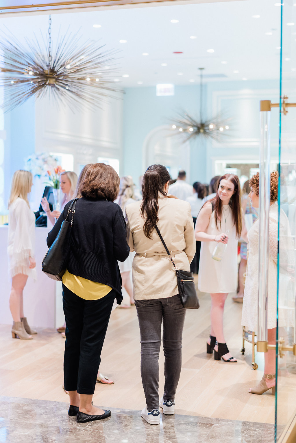 Photography: Giadore Photo | Venue: Kendra Scott Chicago | Catering: Blue Plate Chicago | Hair & Makeup: Kate Johnson Artistry | Floral: Atmospheres Event Group | Stationary: Design That Flies | Gowns: Jenny Yoo NYC | Suits: J Toor