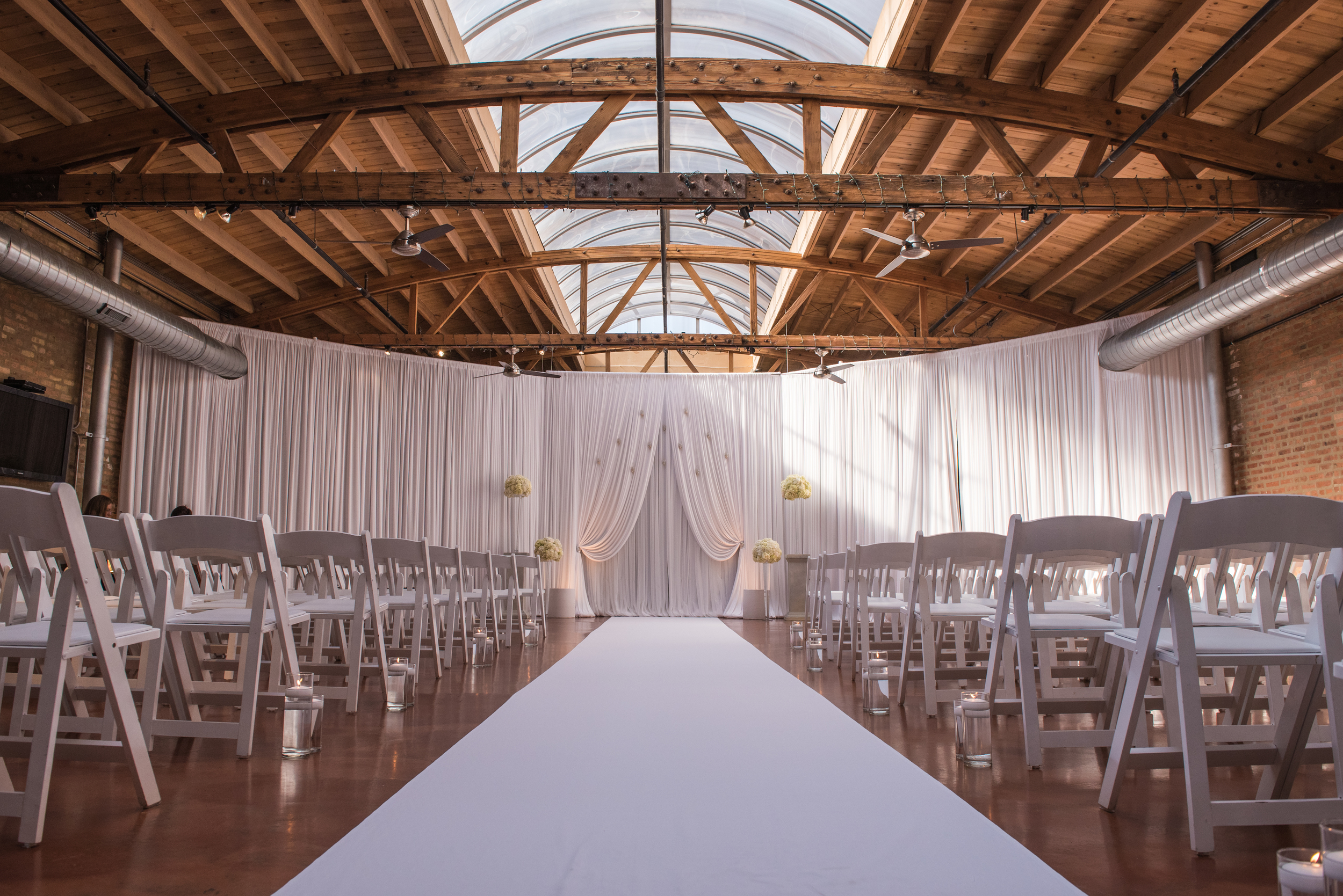 Venue: Loft on Lake | Photography: Thara Photo | Planning: Elisa , The Simply Elegant Group | Draping: Art of Imagination | Floral: Gratitude Heart Garden | Catering: FireFly | Cake: West Town Bakery | Bar: Binny's | Reception: Toast & Jam Transportation: Windy City Limo
