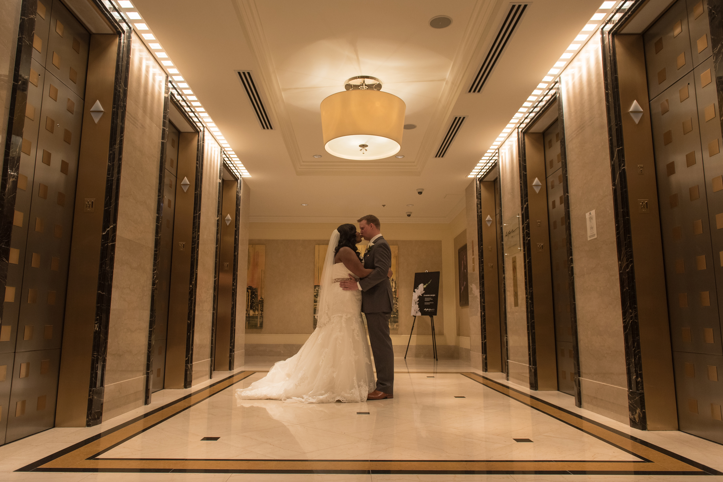 Wedding Venue: Pazzos at 311 | Getting Ready Venue: JW Marriott | Coordination: Lindsay , The Simply Elegant Group | Photography: Tim Hara Photography | Video: Danny Chamberlain | Hair: Mar-Keta Barnes (bride) & Kate Johnson (bridesmaid) | Makeup: Kate Johnson (bridesmaids)| Decor/Floral: Atmosphere Events Group | Cake: More Cupcakes | Ceremony Music: Standing Ovation String Quartet | Reception Entertainment: Style Matters | Photobooth: Traveling Photobooth | Transportation: Limotainment