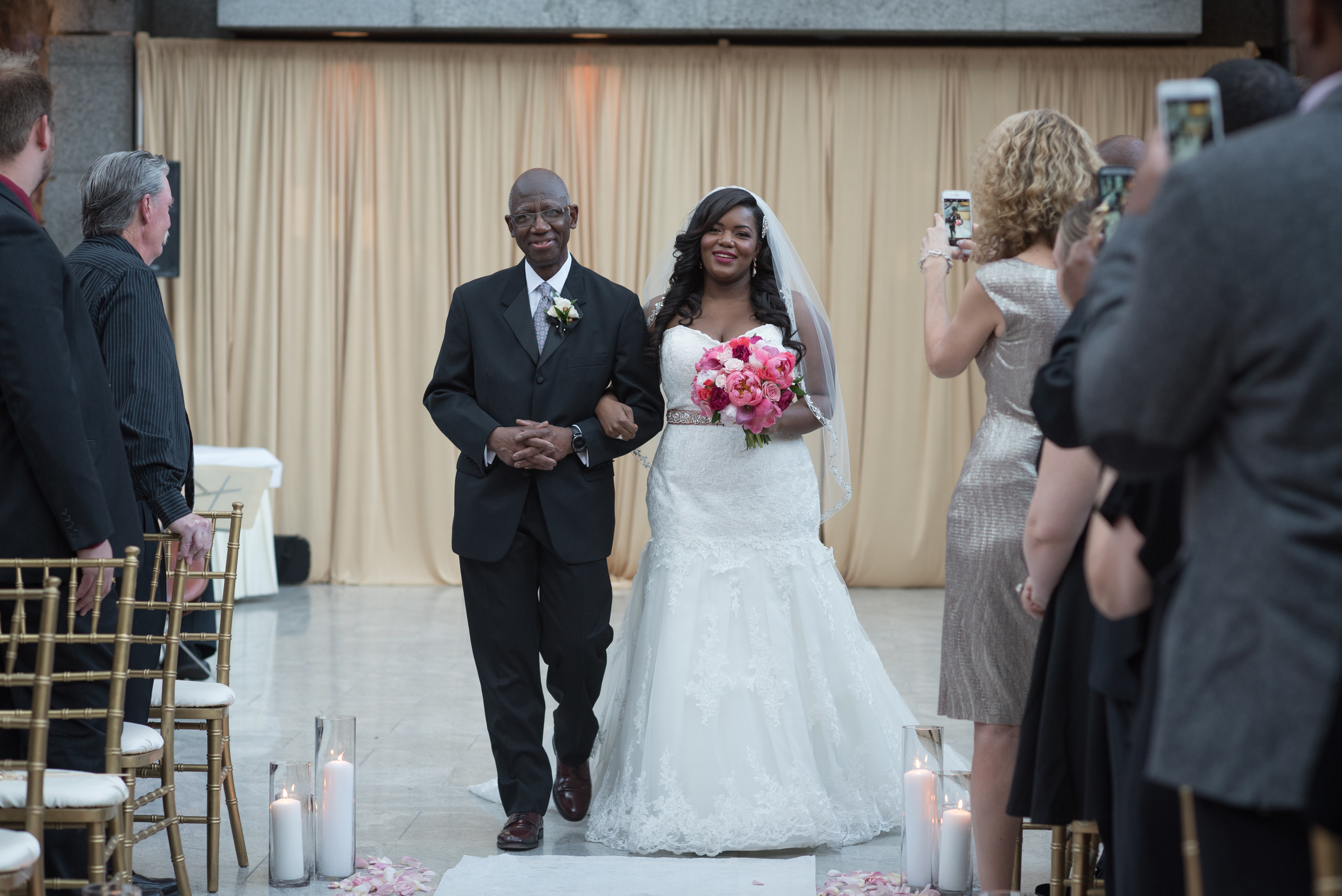 Wedding Venue: Pazzos at 311 | Getting Ready Venue: JW Marriott | Coordination: Lindsay , The Simply Elegant Group | Photography: Tim Hara Photography | Video: Danny Chamberlain | Hair: Mar-Keta Barnes (bride) & Kate Johnson (bridesmaid) | Makeup: Kate Johnson (bridesmaids)| Decor/Floral: Atmosphere Events Group | Cake: More Cupcakes | Ceremony Music: Standing Ovation String Quartet | Reception Entertainment: Style Matters | Photobooth: Traveling Photobooth | Transportation: Limotainment