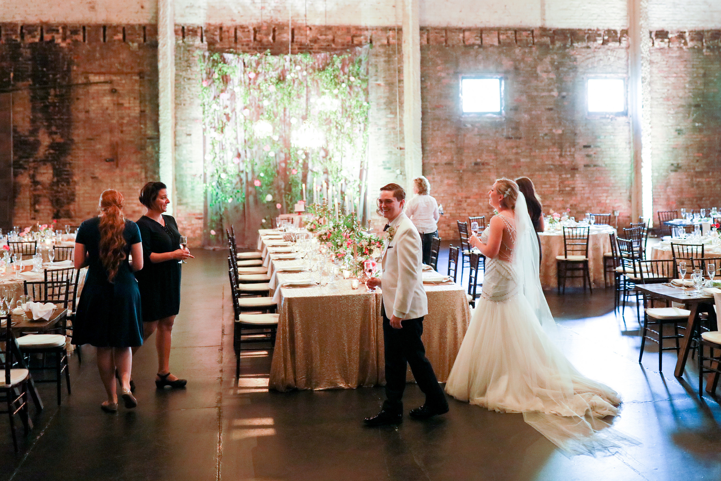 Planner: Nadia | Photographer: Justin Graddy | Dress: Bridal Accents Couture (Watters Gown) Ceremony: Chapel of Saint Thomas Aquinas (UST) | Reception: Aria | Caterer: Deco Catering | Florist: Studio Fleurette | Rentals + Decor: Linen Effects | Cake: Nadia Cakes | Calligrapher: Rosann K | Officiant: Fr. James Stiles / St. Odilia Catholic Church | DJ: Instant Request / Anthony DuBose | Hair + Makeup: Julie Swenson / Primped | Transportation: Total Limo
