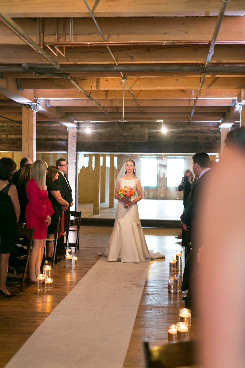 Vendors: Planner: Ashley C. – Simply Elegant Group | Photography: Wakefield Photo | Hair/Makeup: Bev Esquivel – with Kate Johnson Artistry | Venue: Lacuna Artist Lofts | Florist: Victoria Claus – AEG Productions | Caterer: LM Catering | Cake: Sweet Mandy B’s | Ceremony Music: Alex Sokol / Common Knowledge| DJ: Style Matters | Lighting: SC Lighting Design | Photobooth: Traveling Photo Booth | Transportation: Second City Trolley