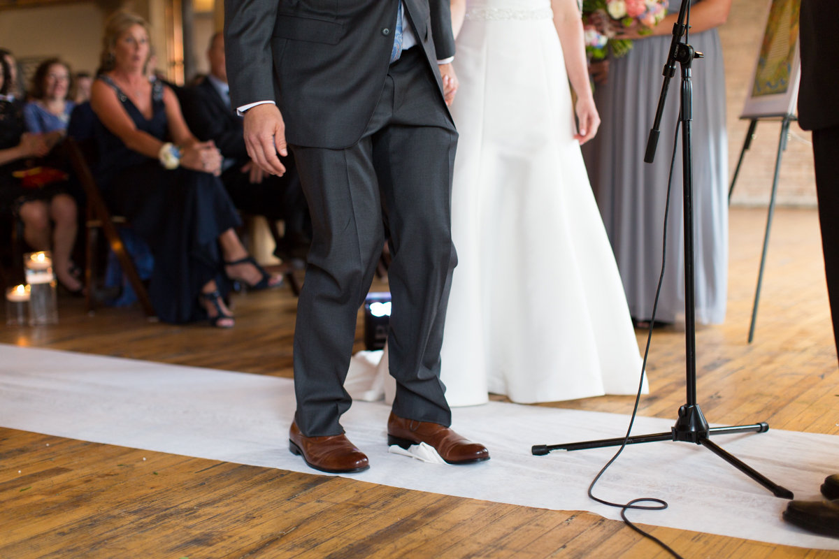 Vendors: Planner: Ashley C. – Simply Elegant Group | Photography: Wakefield Photo | Hair/Makeup: Bev Esquivel – with Kate Johnson Artistry | Venue: Lacuna Artist Lofts | Florist: Victoria Claus – AEG Productions | Caterer: LM Catering | Cake: Sweet Mandy B’s | Ceremony Music: Alex Sokol / Common Knowledge | DJ: Style Matters | Lighting: SC Lighting Design | Photobooth: Traveling Photo Booth | Transportation: Second City Trolley
