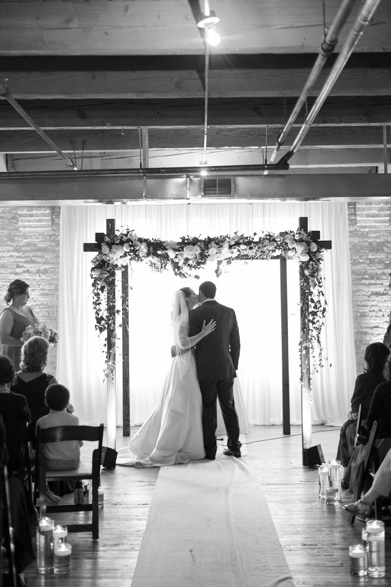 Vendors: Planner: Ashley C. – Simply Elegant Group | Photography: Wakefield Photo | Hair/Makeup: Bev Esquivel – with Kate Johnson Artistry | Venue: Lacuna Artist Lofts | Florist: Victoria Claus – AEG Productions | Caterer: LM Catering | Cake: Sweet Mandy B’s | Ceremony Music: Alex Sokol / Common Knowledge| DJ: Style Matters | Lighting: SC Lighting Design | Photobooth: Traveling Photo Booth | Transportation: Second City Trolley