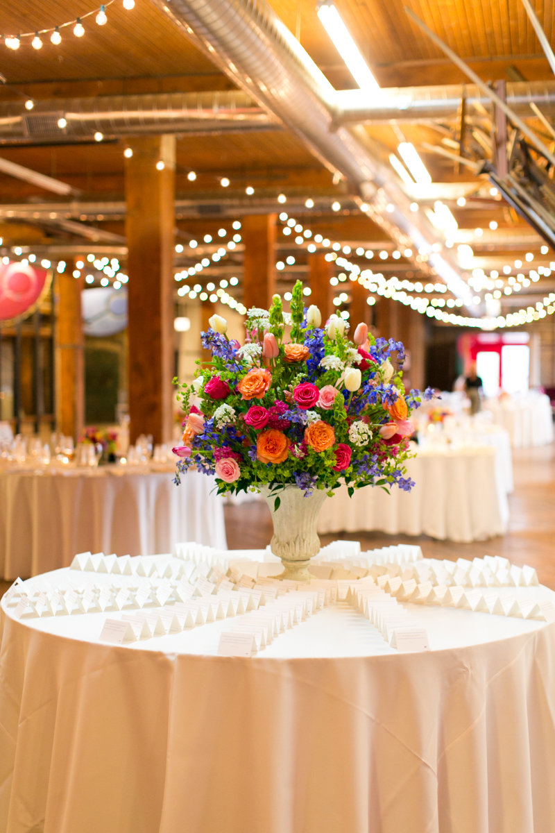 Vendors: Planner: Ashley C. – Simply Elegant Group | Photography: Wakefield Photo | Hair/Makeup: Bev Esquivel – with Kate Johnson Artistry | Venue: Lacuna Artist Lofts | Florist: Victoria Claus – AEG Productions | Caterer: LM Catering | Cake: Sweet Mandy B’s | Ceremony Music: Alex Sokol / Common Knowledge| DJ: Style Matters | Lighting: SC Lighting Design | Photobooth: Traveling Photo Booth | Transportation: Second City Trolley