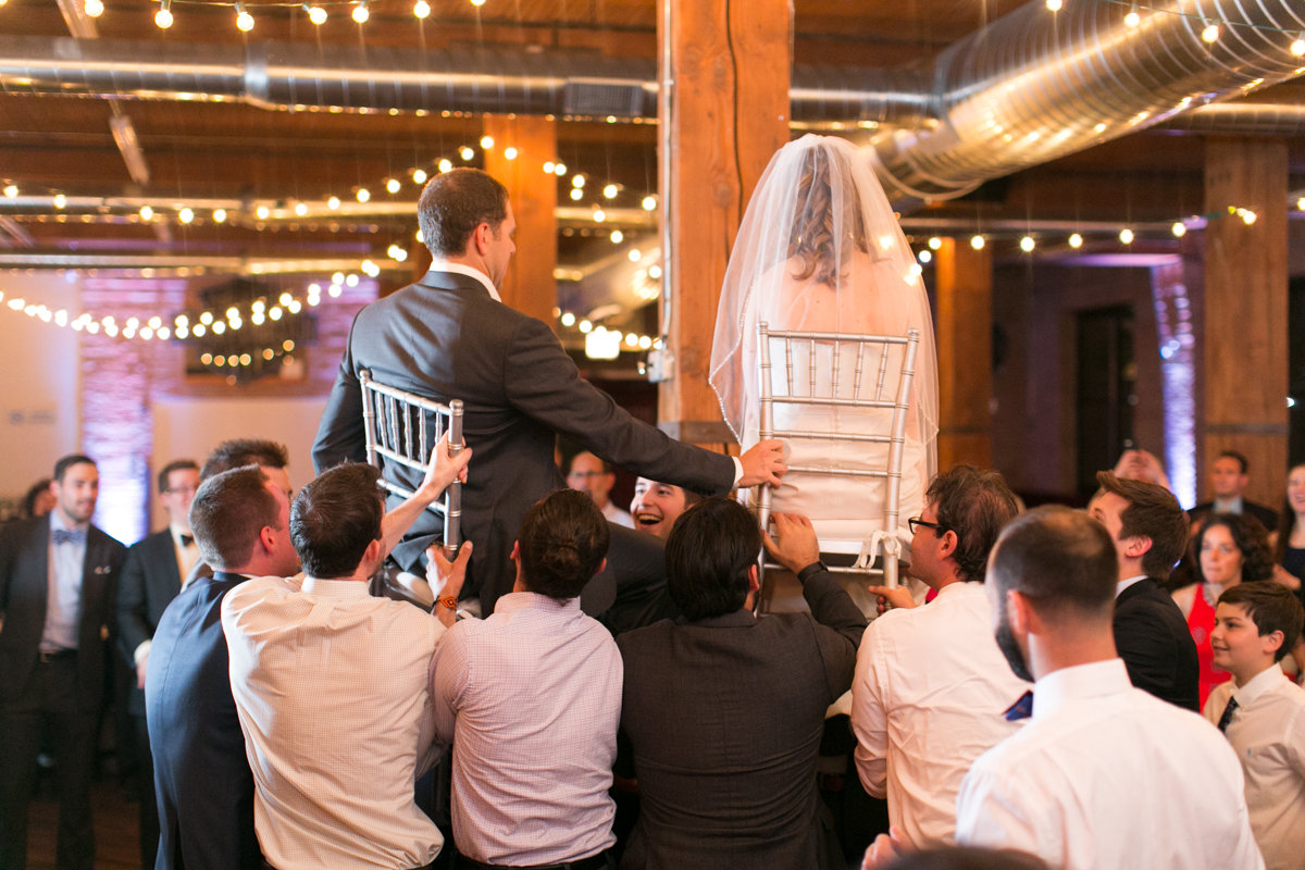 Vendors: Planner: Ashley C. – Simply Elegant Group | Photography: Wakefield Photo | Hair/Makeup: Bev Esquivel – with Kate Johnson Artistry | Venue: Lacuna Artist Lofts | Florist: Victoria Claus – AEG Productions | Caterer: LM Catering | Cake: Sweet Mandy B’s | Ceremony Music: Alex Sokol / Common Knowledge| DJ: Style Matters | Lighting: SC Lighting Design | Photobooth: Traveling Photo Booth | Transportation: Second City Trolley