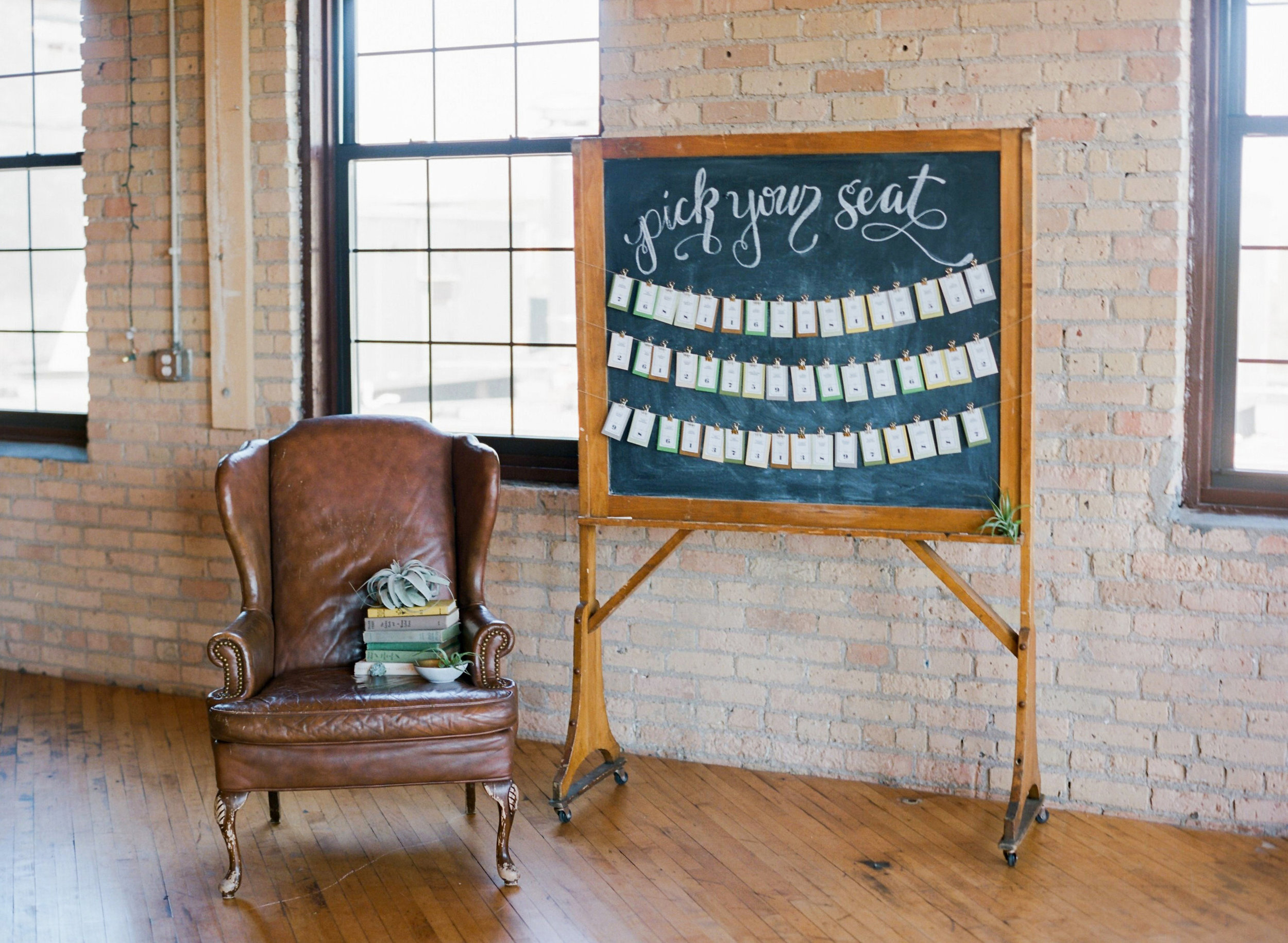 Vendors: Photography: Jody Savage Photography | Videography: Acowsay | Groomswear: Savvy Formalwear | Dress: Natalie by Truvelle , A and B Bridal Shop | Makeup: Julie Swenson Beauty | Hair: Teanna Moye Artistry | Venue: Solar Arts Chowgirls | Rentals & Design: On Solid Ground Vintage Rentals | Floral Design: Studio Fleurette | Florals: Fifty Flowers | Cake Topper, Custom Lettering, Escort+Place Cards: Splendid Supply Co. | Cake Stands, Guest Book + Invites: Minted | Food + Cake: Chow Girl Catering