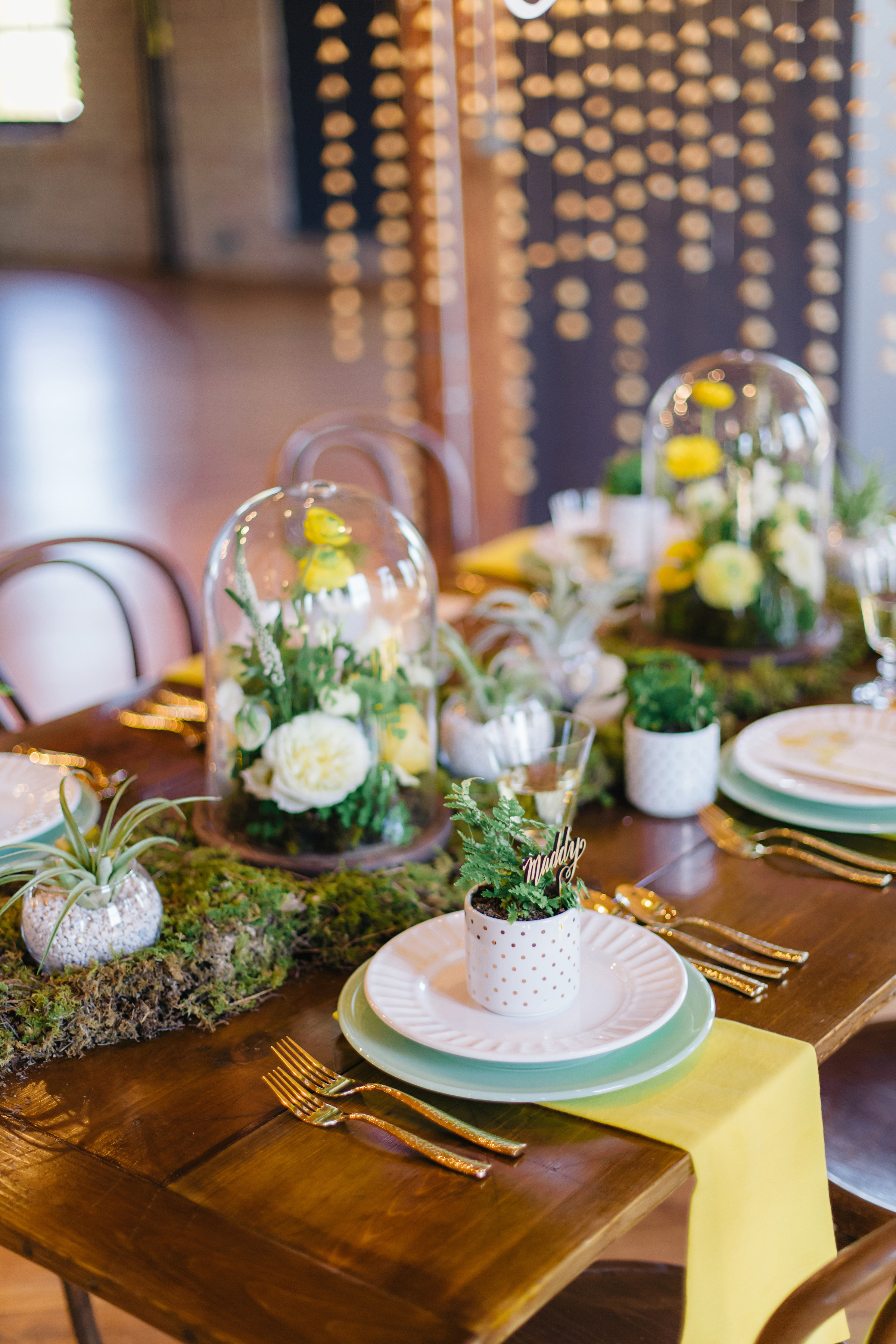 Vendors: Photography: Jody Savage Photography | Videography: Acowsay | Groomswear: Savvy Formalwear | Dress: Natalie by Truvelle , A and B Bridal Shop | Makeup: Julie Swenson Beauty | Hair: Teanna Moye Artistry | Venue: Solar Arts Chowgirls | Rentals & Design: On Solid Ground Vintage Rentals | Floral Design: Studio Fleurette | Florals: Fifty Flowers | Cake Topper, Custom Lettering, Escort+Place Cards: Splendid Supply Co. | Cake Stands, Guest Book + Invites: Minted | Food + Cake: Chow Girl Catering