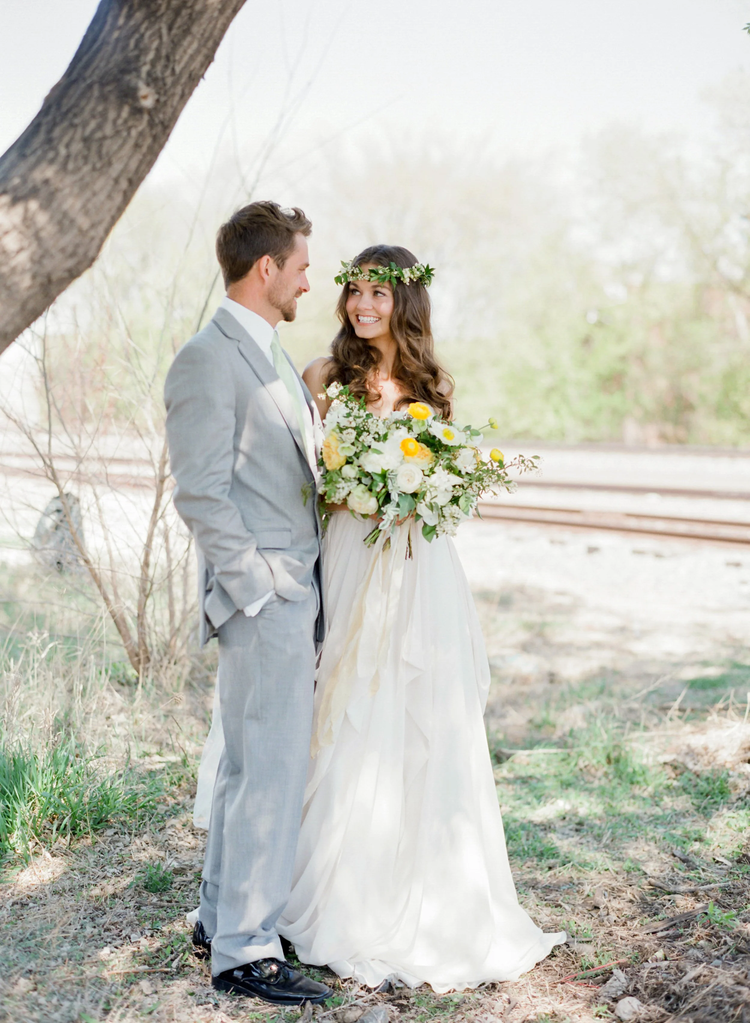 Vendors: Photography: Jody Savage Photography | Videography: Acowsay | Groomswear: Savvy Formalwear | Dress: Natalie by Truvelle , A and B Bridal Shop | Makeup: Julie Swenson Beauty | Hair: Teanna Moye Artistry | Venue: Solar Arts Chowgirls | Rentals & Design: On Solid Ground Vintage Rentals | Floral Design: Studio Fleurette | Florals: Fifty Flowers | Cake Topper, Custom Lettering, Escort+Place Cards: Splendid Supply Co. | Cake Stands, Guest Book + Invites: Minted | Food + Cake: Chow Girl Catering