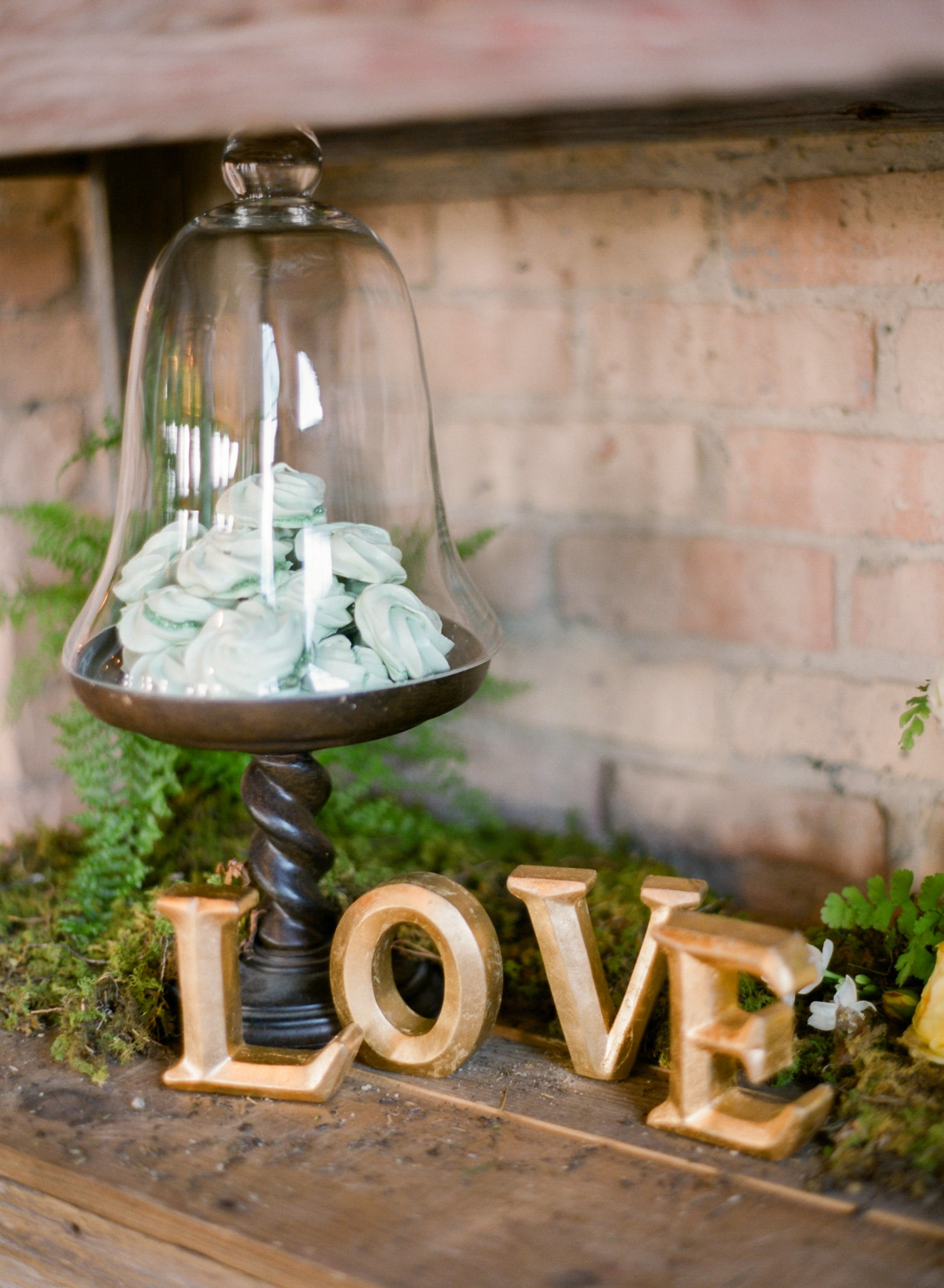 Vendors: Photography: Jody Savage Photography | Videography: Acowsay | Groomswear: Savvy Formalwear | Dress: Natalie by Truvelle , A and B Bridal Shop | Makeup: Julie Swenson Beauty | Hair: Teanna Moye Artistry | Venue: Solar Arts Chowgirls | Rentals & Design: On Solid Ground Vintage Rentals | Floral Design: Studio Fleurette | Florals: Fifty Flowers | Cake Topper, Custom Lettering, Escort+Place Cards: Splendid Supply Co. | Cake Stands, Guest Book + Invites: Minted | Food + Cake: Chow Girl Catering
