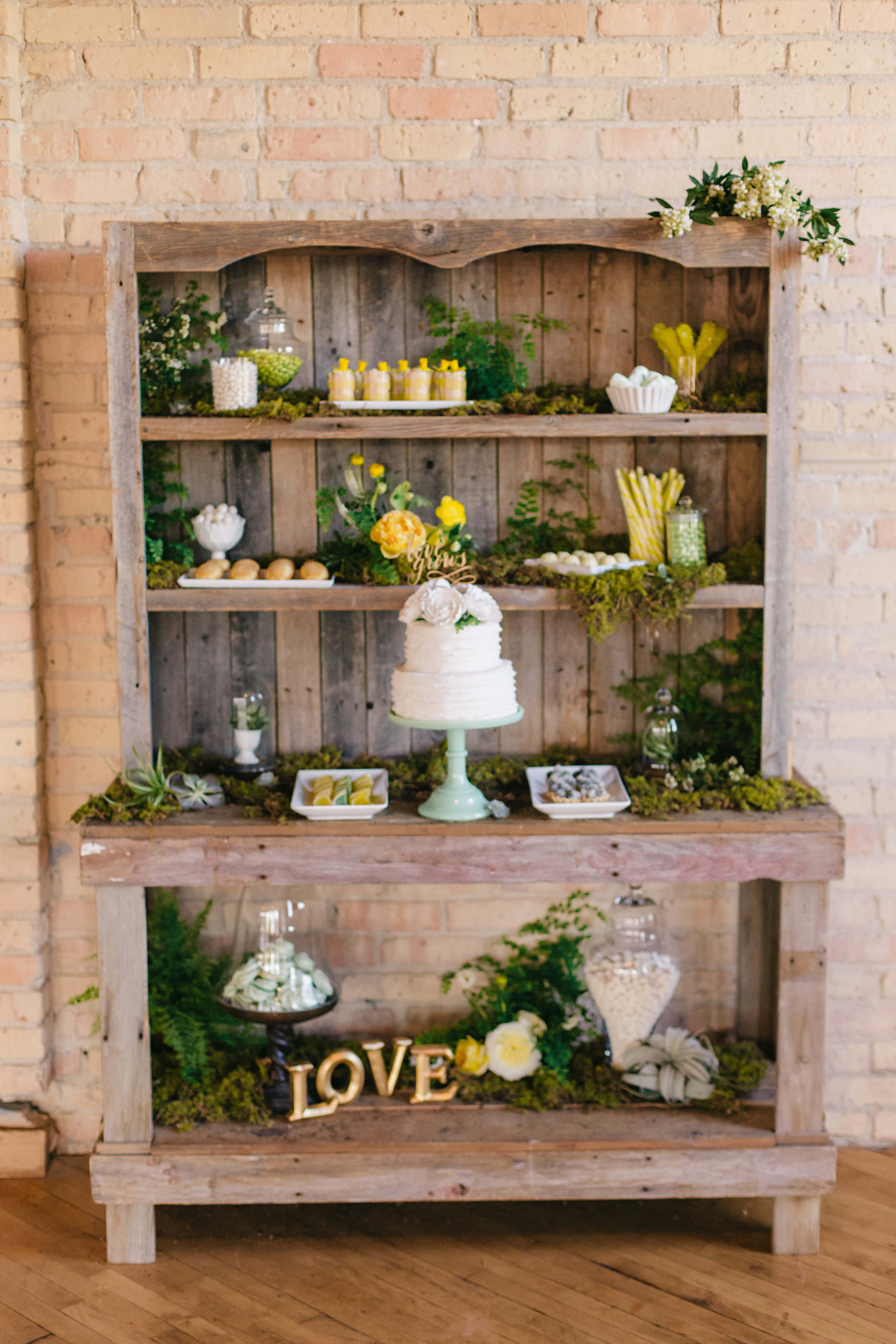 Vendors: Photography: Jody Savage Photography | Videography: Acowsay | Groomswear: Savvy Formalwear | Dress: Natalie by Truvelle , A and B Bridal Shop | Makeup: Julie Swenson Beauty | Hair: Teanna Moye Artistry | Venue: Solar Arts Chowgirls | Rentals & Design: On Solid Ground Vintage Rentals | Floral Design: Studio Fleurette | Florals: Fifty Flowers | Cake Topper, Custom Lettering, Escort+Place Cards: Splendid Supply Co. | Cake Stands, Guest Book + Invites: Minted | Food + Cake: Chow Girl Catering