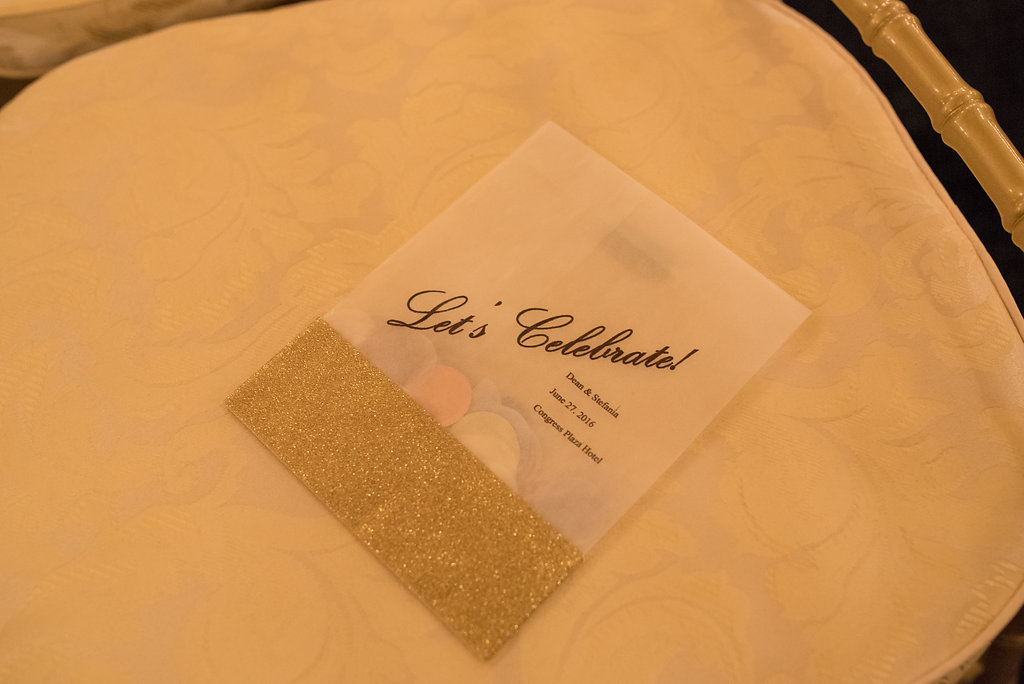 Vendors: Photographer: Thara Photo | Planner: Elisa , The Simply Elegant Group | Venue: Congress Plaza Hotel | Hair + Makeup: Stylisted | Dress: Opus Couture | Stationery: EYI Love | Florals: Virgina Wolff | Rentals (champagne tower): Vintage Place Settings | Cake: Amy Beck Cake Designs | Ceremony Music: Moeller Music | Reception Entertainment: One Night Band | Videography: O'Grady Cinema | Officiant: Calvin Denison, Chicago Officiant Services