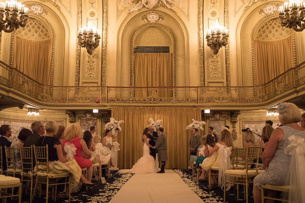 Vendors: Photographer: Thara Photo | Planner: Elisa , The Simply Elegant Group | Venue: Congress Plaza Hotel | Hair + Makeup: Stylisted | Dress: Opus Couture | Stationery: EYI Love | Florals: Virgina Wolff | Rentals (champagne tower): Vintage Place Settings | Cake: Amy Beck Cake Designs | Ceremony Music: Moeller Music | Reception Entertainment: One Night Band | Videography: O'Grady Cinema | Officiant: Calvin Denison, Chicago Officiant Services