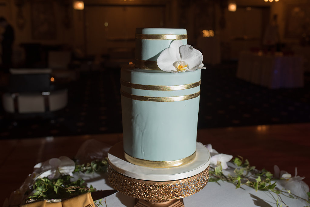 Vendors: Photographer: Thara Photo | Planner: Elisa , The Simply Elegant Group | Venue: Congress Plaza Hotel | Hair + Makeup: Stylisted | Dress: Opus Couture | Stationery: EYI Love | Florals: Virgina Wolff | Rentals (champagne tower): Vintage Place Settings | Cake: Amy Beck Cake Designs | Ceremony Music: Moeller Music | Reception Entertainment: One Night Band | Videography: O'Grady Cinema | Officiant: Calvin Denison, Chicago Officiant Services