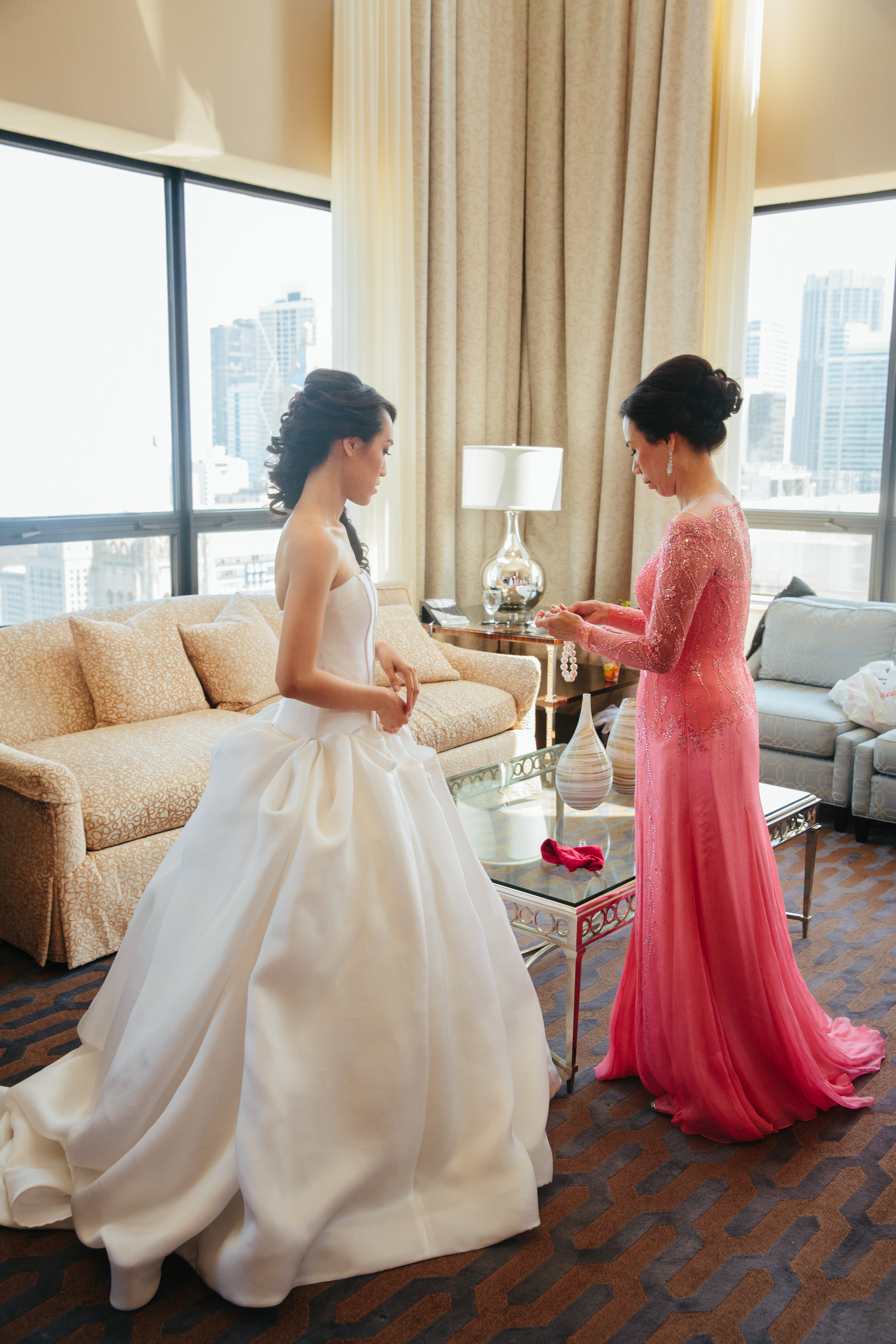 Vendors-Venue: The Ritz-Carlton Chicago | Planner: The Simply Elegant Group, Lindsay | Photographer: Lorenzo De Gregorio Photography | Lighting/Florals/Decor: Atmosphere's Event Group | Videographer: Turning Point Cinema |Hair + Makeup: Kate Johnson & Sonia Roselli | Veil + Dress: Custom Vera Wang | Music: Chicago Movers & Shakers | Photobooth: Concept One | Transportation: Loyalty Limo