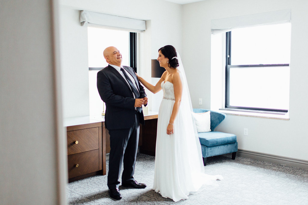 Photography: Tim Tab Studios | Coordination: The Simply Elegant Group, Lindsay | Floral design: The Bread and Butterfly | Decor: Art of Imagination | Hair: Holli Beauty | Makeup: Joanna B Artistry and Anjelica Bannos | Bride’s gown: Sarah Seven | Groom's tux: The Black Tux | Bridesmaids: Show Me Your MuMu | Venue: Bridgeport Art Center | Catering: Limelight Catering