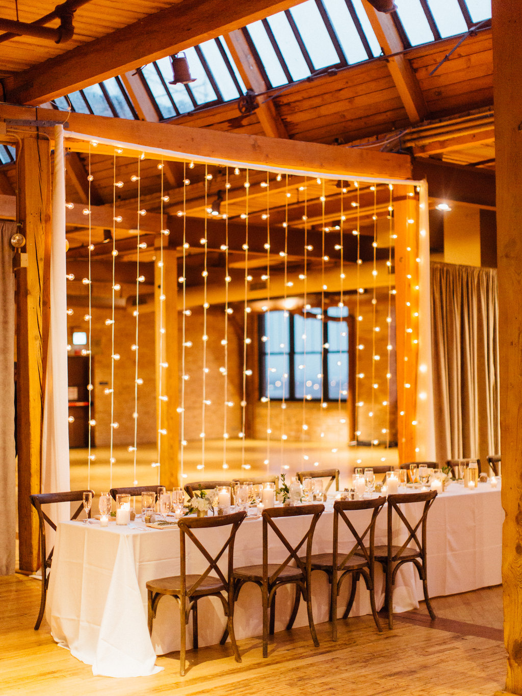 Photography: Tim Tab Studios | Coordination: The Simply Elegant Group, Lindsay | Floral design: The Bread and Butterfly | Decor: Art of Imagination | Hair: Holli Beauty | Makeup: Joanna B Artistry and Anjelica Bannos | Bride’s gown: Sarah Seven | Groom's tux: The Black Tux | Bridesmaids: Show Me Your MuMu | Venue: Bridgeport Art Center | Catering: Limelight Catering