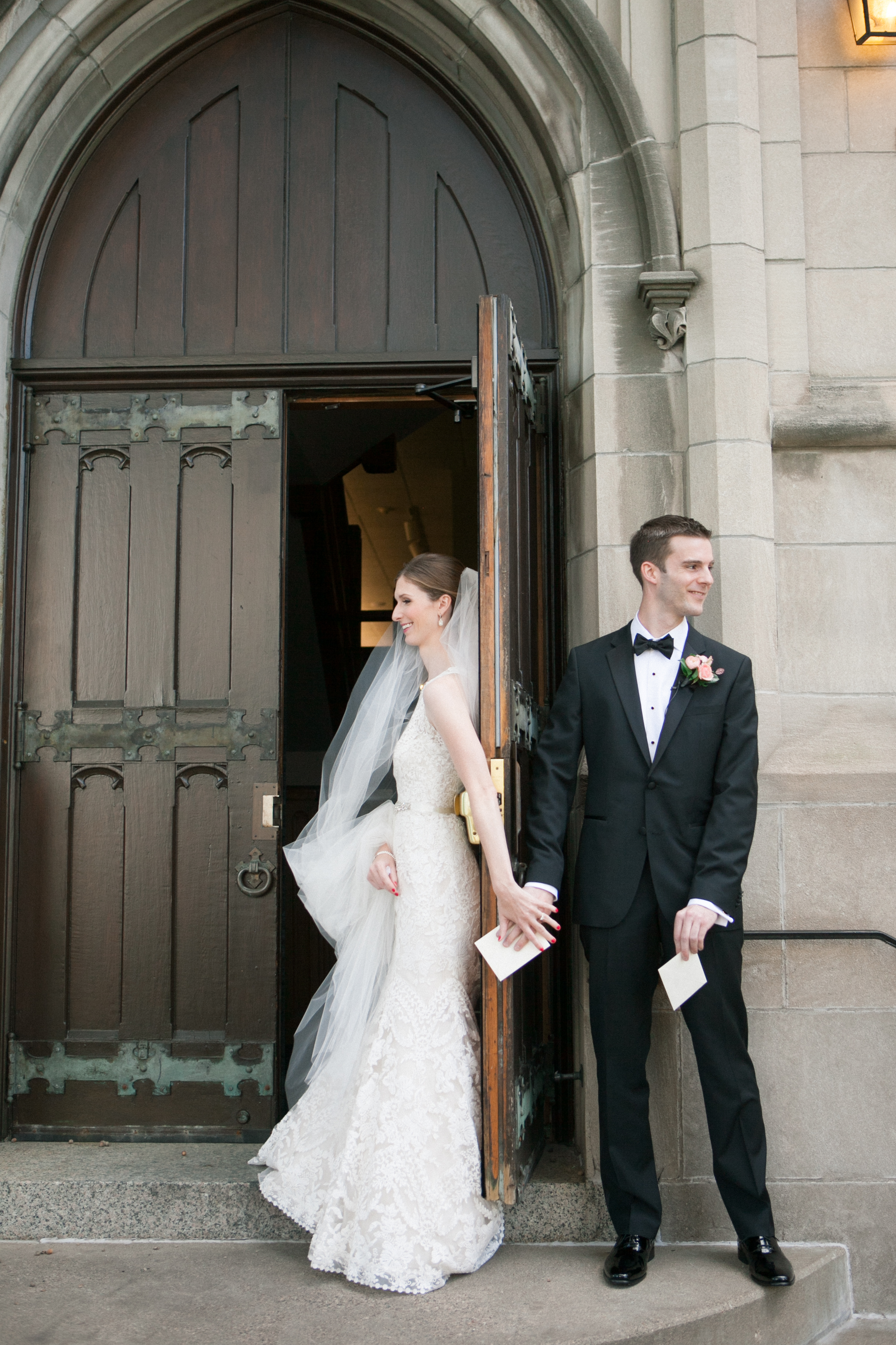 Vendors: Photographer: Laura Ivanova | Invitations: Minted | Ceremony Venue: Hennepin Avenue United Methodist Church | Reception Venue: James J. Hill Center | Flowers: Molly’s Flower Studio | Hair/MakeUp Artist: Warpaint Beauty Agency | Bride's Dress: BHLDN | Men's Attire: Hugo Boss | Linens/Decor/Rentals: Apres Party and Tent | Entertainment: Adagio Entertainment | Catering: Green Mangos Catering | Bar: Mintahoe | Cake: Sweet Retreat MN | Transportation: Northfield Lines , Eclipse Limos & Valley Limos