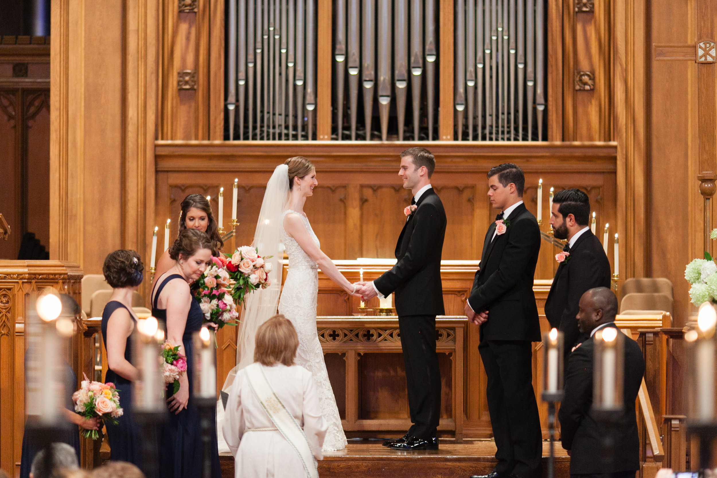 Vendors: Photographer: Laura Ivanova | Invitations: Minted | Ceremony Venue: Hennepin Avenue United Methodist Church | Reception Venue: James J. Hill Center | Flowers: Molly’s Flower Studio | Hair/MakeUp Artist: Warpaint Beauty Agency | Bride's Dress: BHLDN | Men's Attire: Hugo Boss | Linens/Decor/Rentals: Apres Party and Tent | Entertainment: Adagio Entertainment | Catering: Green Mangos Catering | Bar: Mintahoe | Cake: Sweet Retreat MN | Transportation: Northfield Lines , Eclipse Limos & Valley Limos