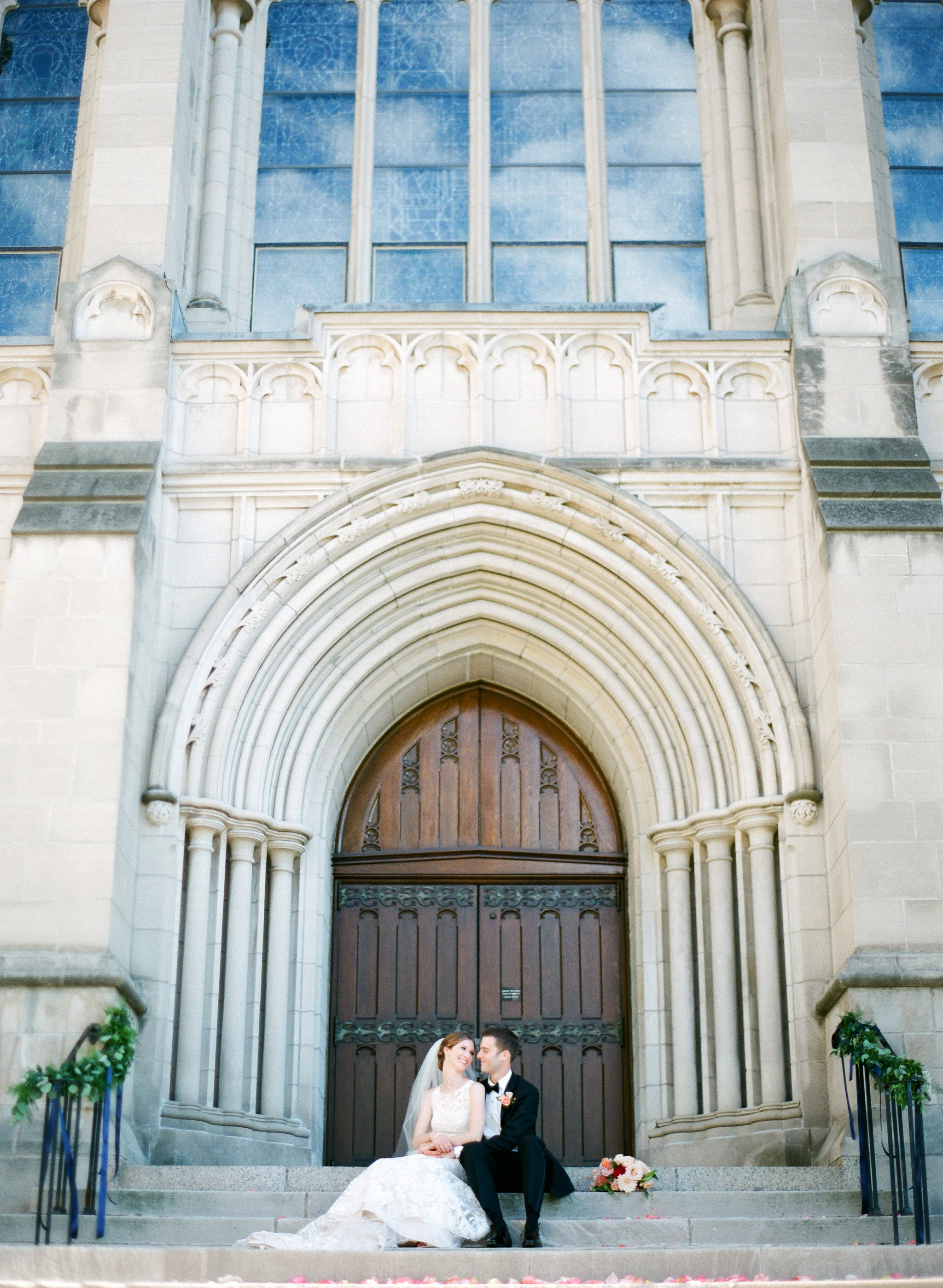 Vendors: Photographer: Laura Ivanova | Invitations: Minted | Ceremony Venue: Hennepin Avenue United Methodist Church | Reception Venue: James J. Hill Center | Flowers: Molly’s Flower Studio | Hair/MakeUp Artist: Warpaint Beauty Agency | Bride's Dress: BHLDN | Men's Attire: Hugo Boss | Linens/Decor/Rentals: Apres Party and Tent | Entertainment: Adagio Entertainment | Catering: Green Mangos Catering | Bar: Mintahoe | Cake: Sweet Retreat MN | Transportation: Northfield Lines , Eclipse Limos & Valley Limos