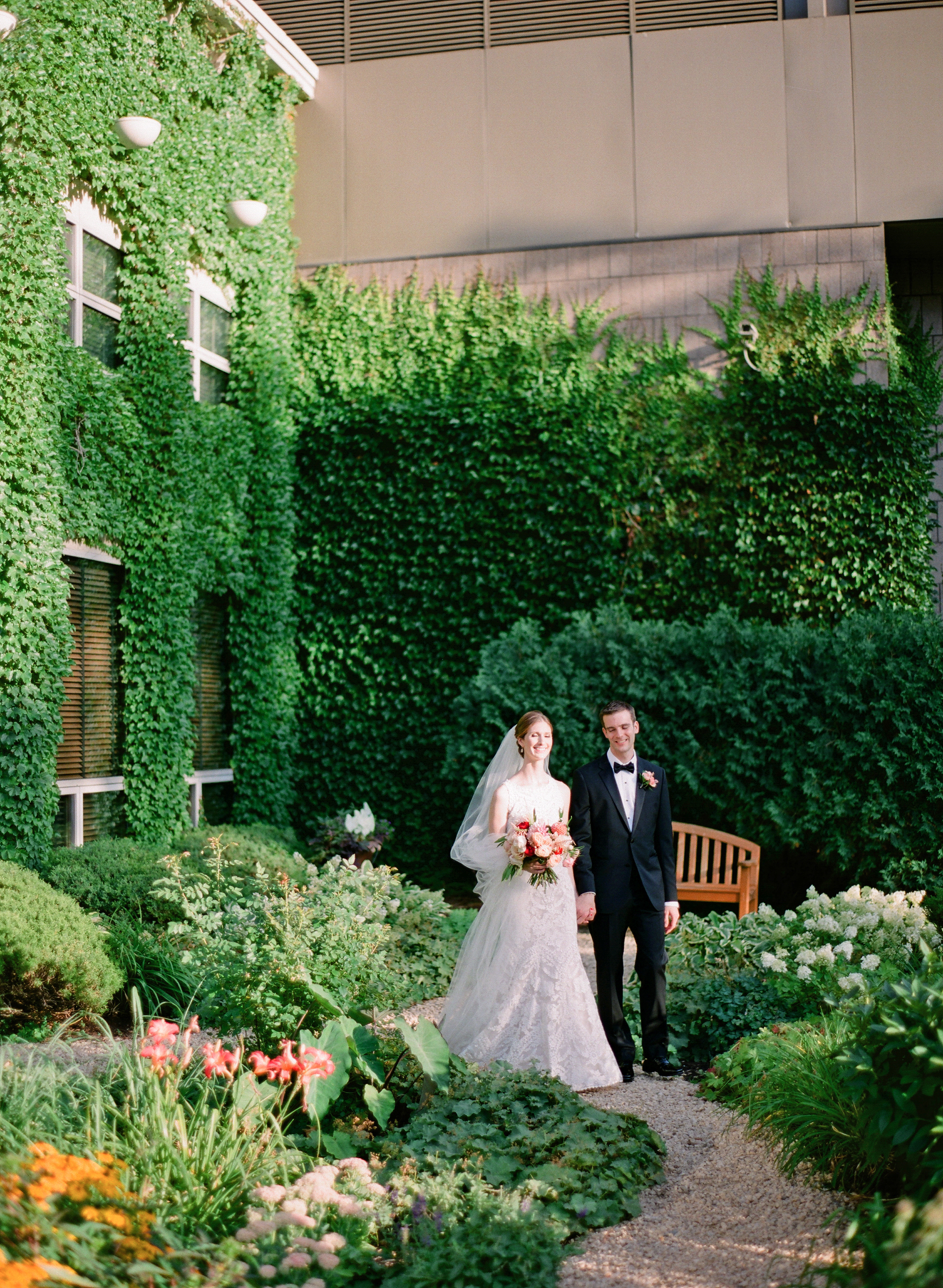 Vendors: Photographer: Laura Ivanova | Invitations: Minted | Ceremony Venue: Hennepin Avenue United Methodist Church | Reception Venue: James J. Hill Center | Flowers: Molly’s Flower Studio | Hair/MakeUp Artist: Warpaint Beauty Agency | Bride's Dress: BHLDN | Men's Attire: Hugo Boss | Linens/Decor/Rentals: Apres Party and Tent | Entertainment: Adagio Entertainment | Catering: Green Mangos Catering | Bar: Mintahoe | Cake: Sweet Retreat MN | Transportation: Northfield Lines , Eclipse Limos & Valley Limos
