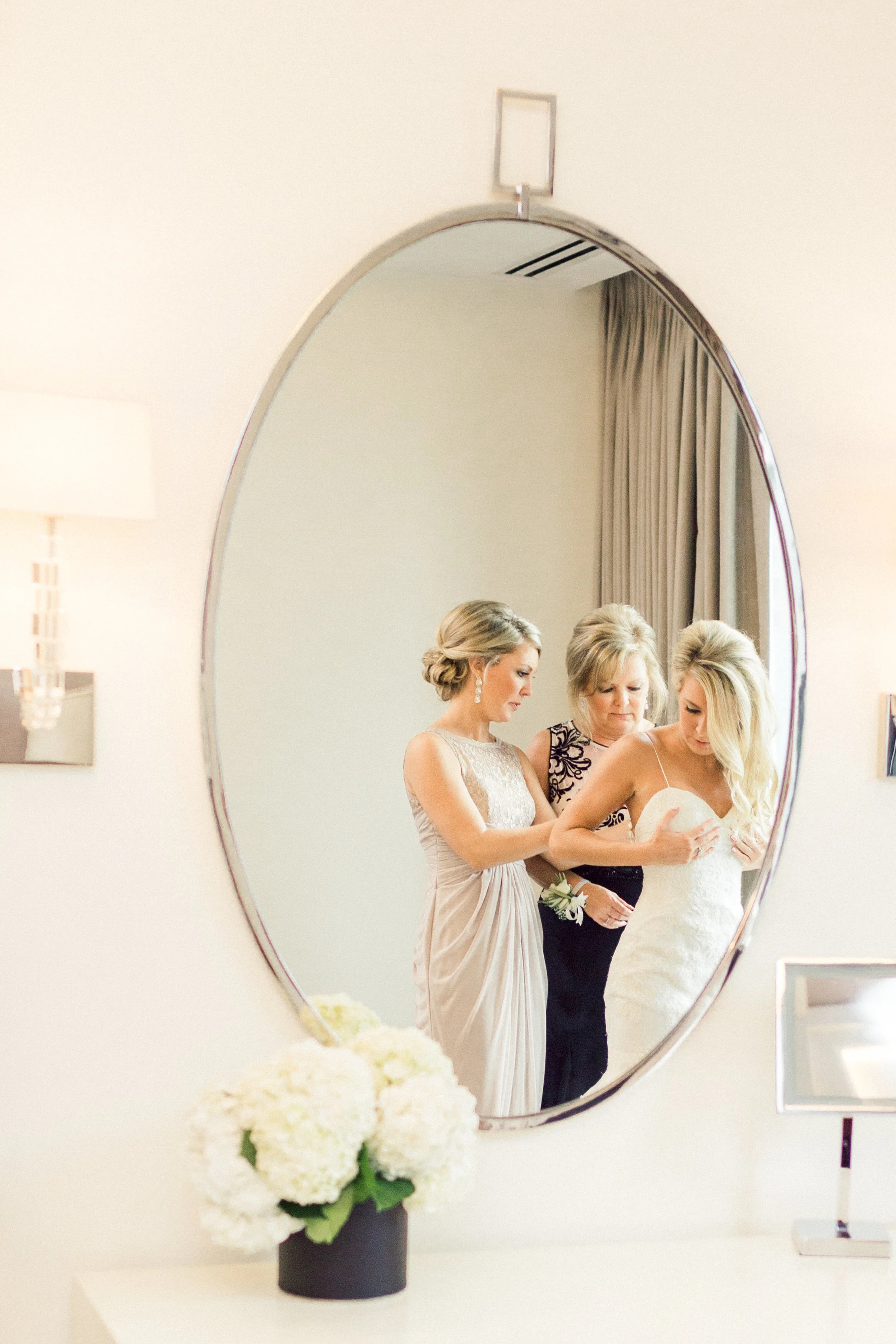 Day of Coordinator: The Simply Elegant Group, Elisa | Bridal Prep: The Langham Chicago | Groom Prep: State and Chestnut Apartments | Ceremony: St. Michael Church in Old Town | Reception: Loews Chicago O’Hare Hotel (Rosemont)| Bridal Dress: Nordstrom designed by Monique Lhuillier | Bridal Shoes: Vince Camuto | Groom & Groomsmen tuxes: Black Tie Formalwear designed by Ike Behar| Makeup: Niki Spano | Hair: PURE Salon & Spa | Floral: Natural Beauties Floral | Cake: Cake Sweet Foods | Band: Maggie Speaks | Photography: Dabble Me This | Wedding Cinematography: Delack Media Group