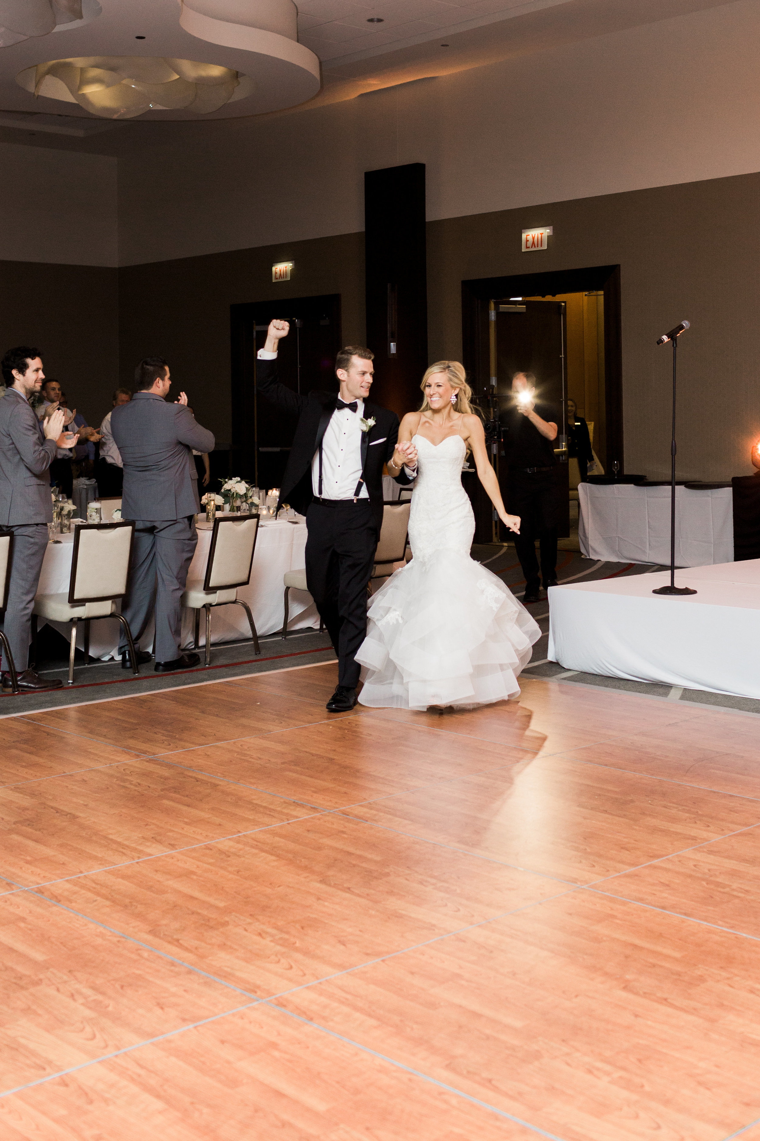 Day of Coordinator: The Simply Elegant Group, Elisa | Bridal Prep: The Langham Chicago | Groom Prep: State and Chestnut Apartments | Ceremony: St. Michael Church in Old Town | Reception: Loews Chicago O’Hare Hotel (Rosemont)| Bridal Dress: Nordstrom designed by Monique Lhuillier | Bridal Shoes: Vince Camuto | Groom & Groomsmen tuxes: Black Tie Formalwear designed by Ike Behar| Makeup: Niki Spano | Hair: PURE Salon & Spa | Floral: Natural Beauties Floral | Cake: Cake Sweet Foods | Band: Maggie Speaks | Photography: Dabble Me This | Wedding Cinematography: Delack Media Group