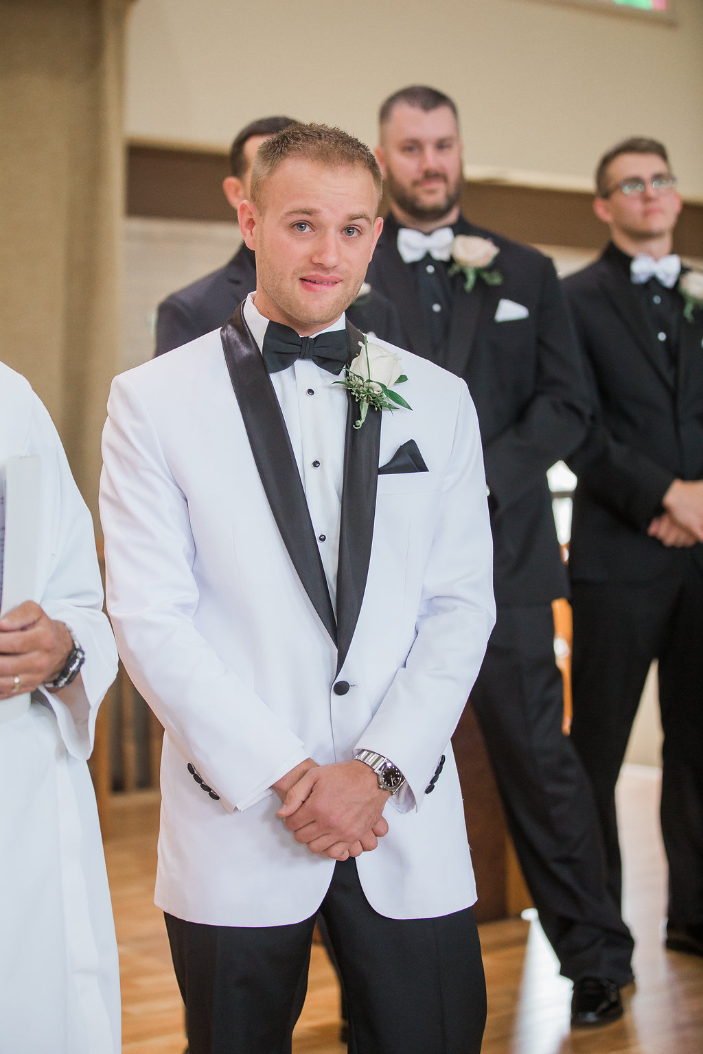 Groom seeing bride for first time during wedding ceremony