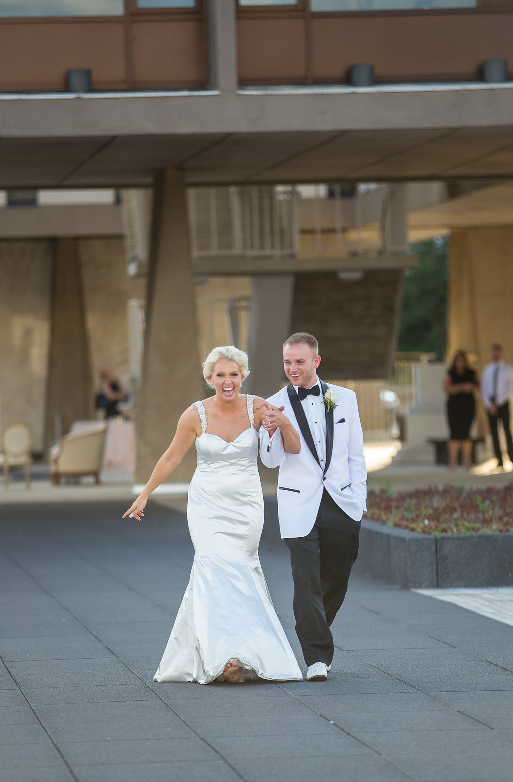Bride and Groom's grand entrance to reception at The War Memorial Center, Fitch Plaza wedding