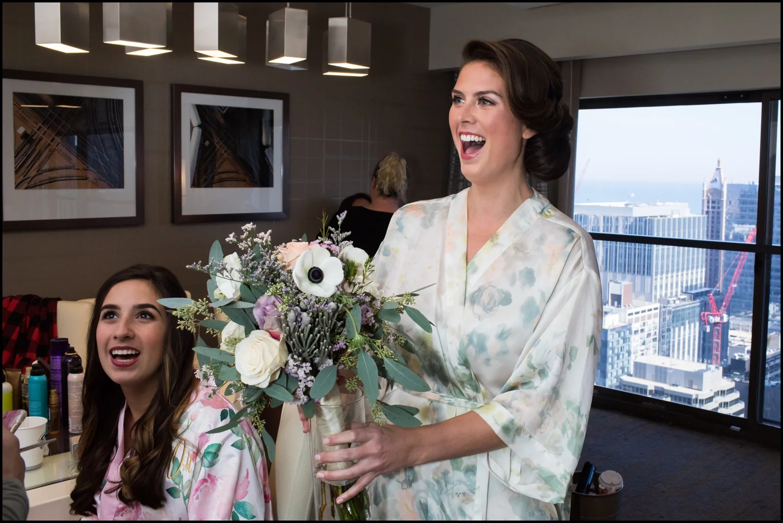 bride getting ready with her bridesmaids