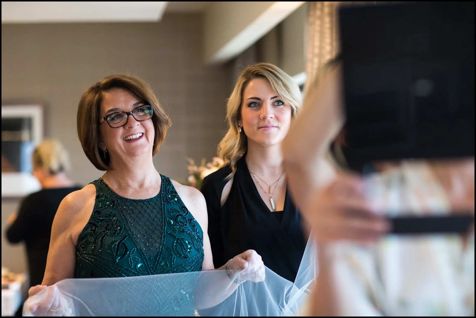 mother helping the bride