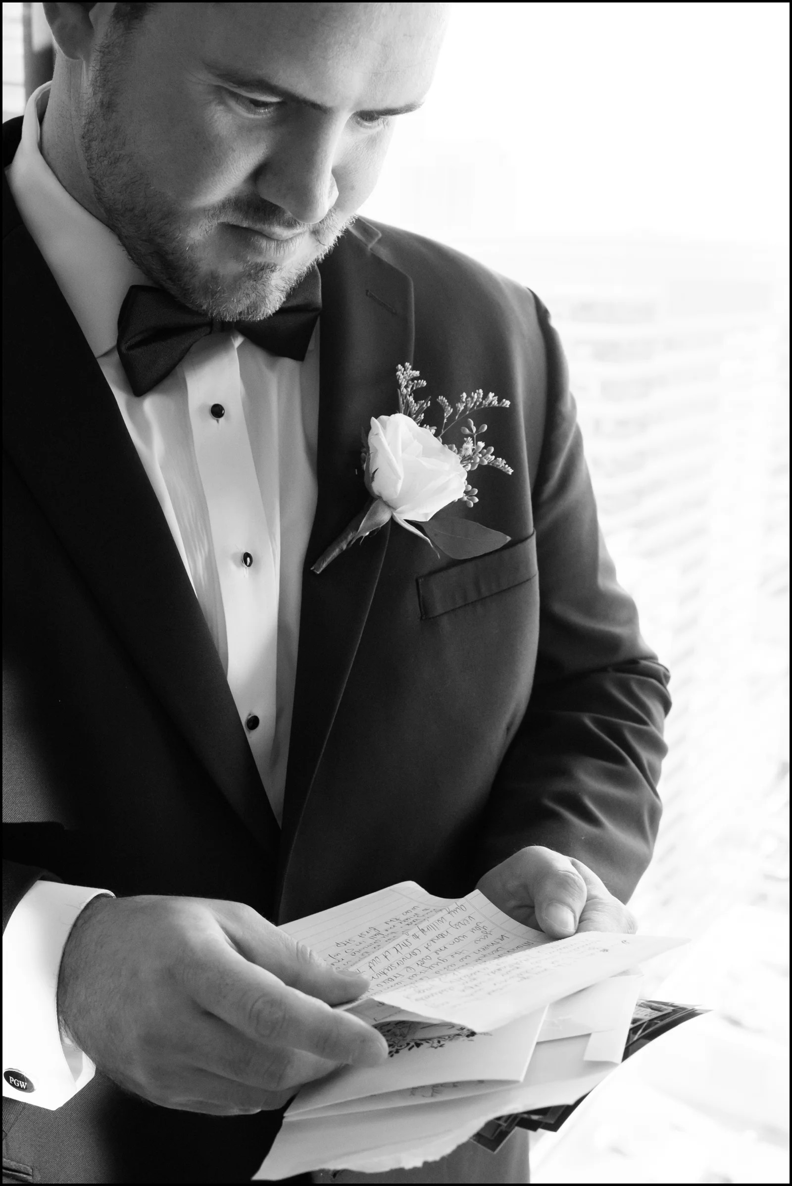 groom reading a letter