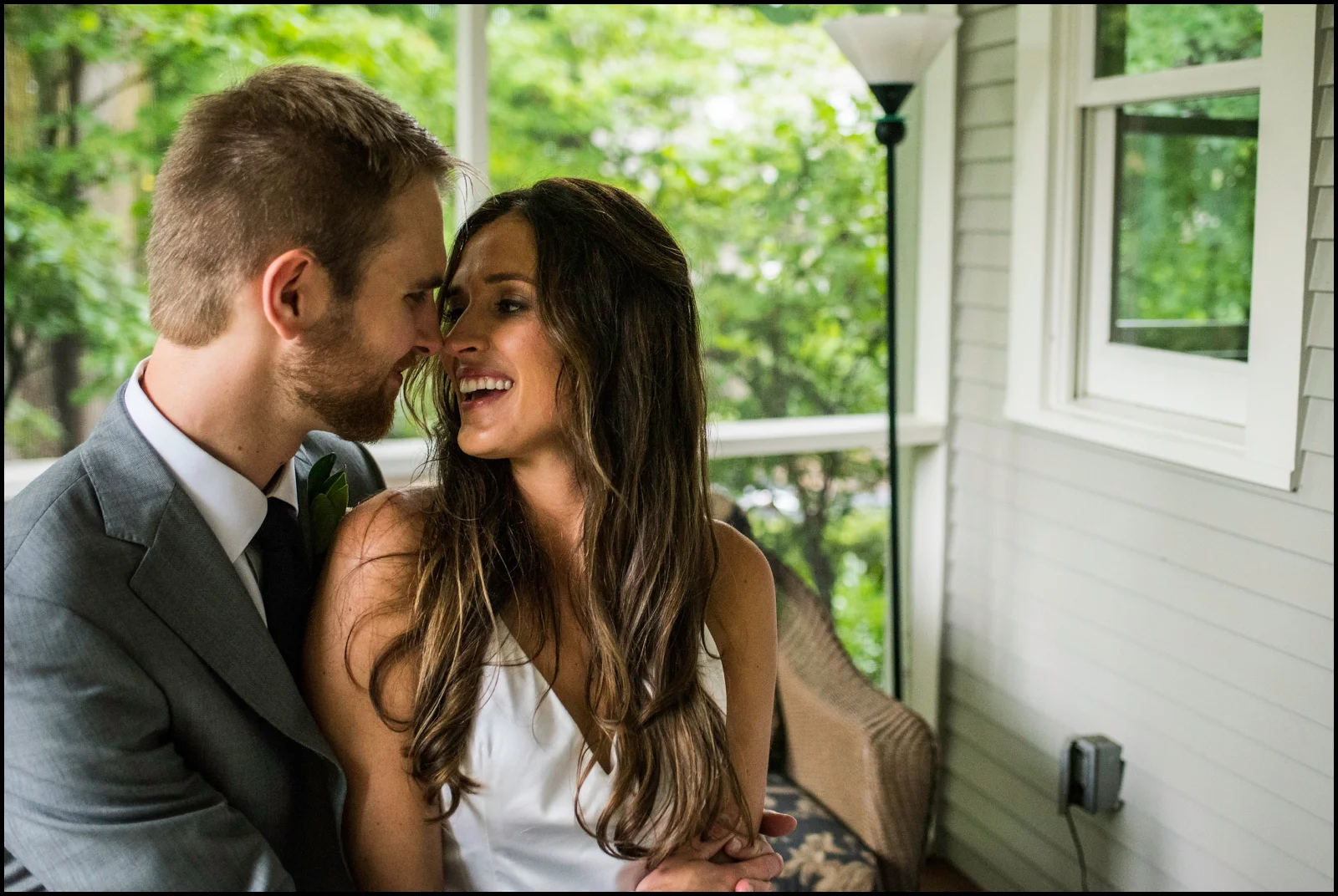 bride and groom smiling