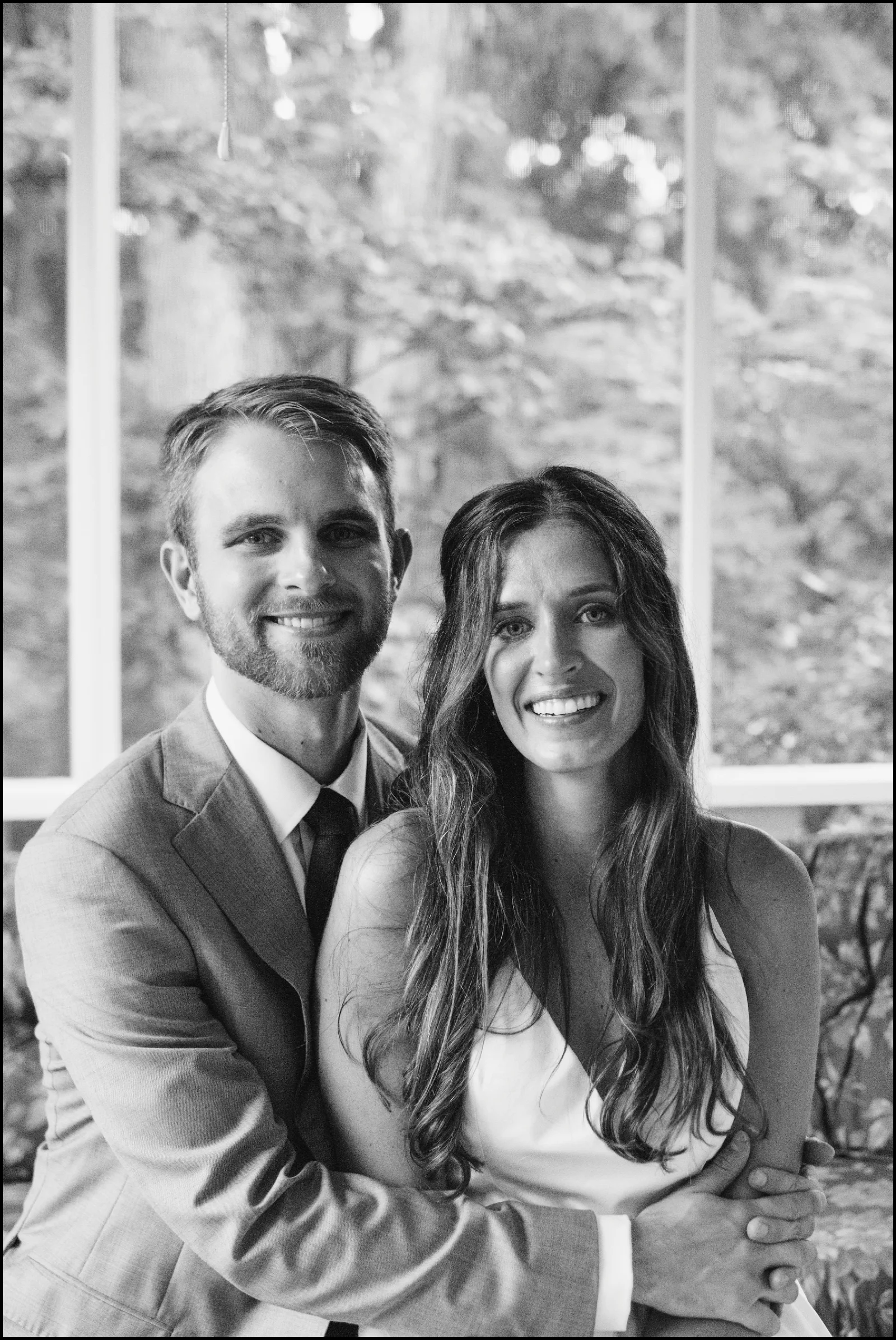 bride and groom smiling