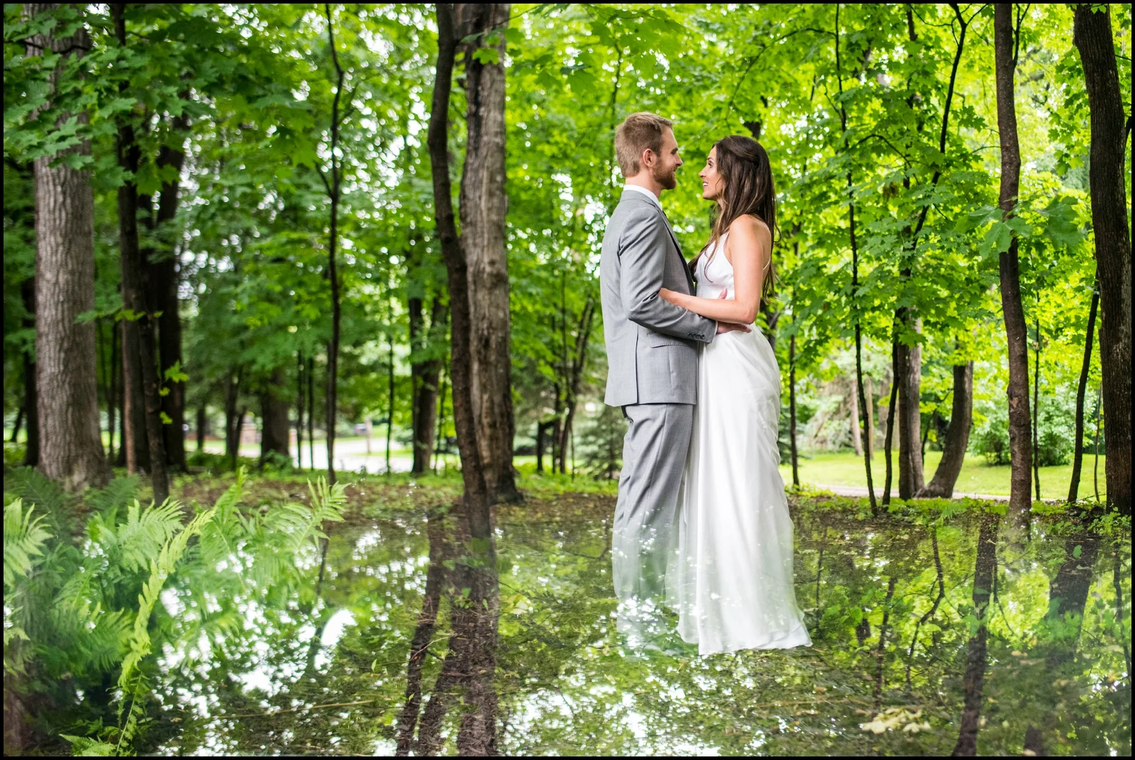 bride and groom in the woods