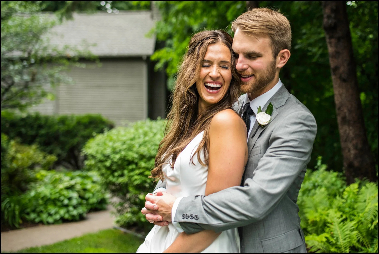 bride laughing with the groom