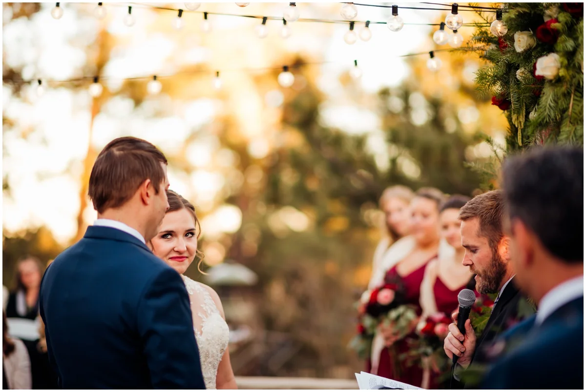 bride glancing at the groom during their Colorado wedding